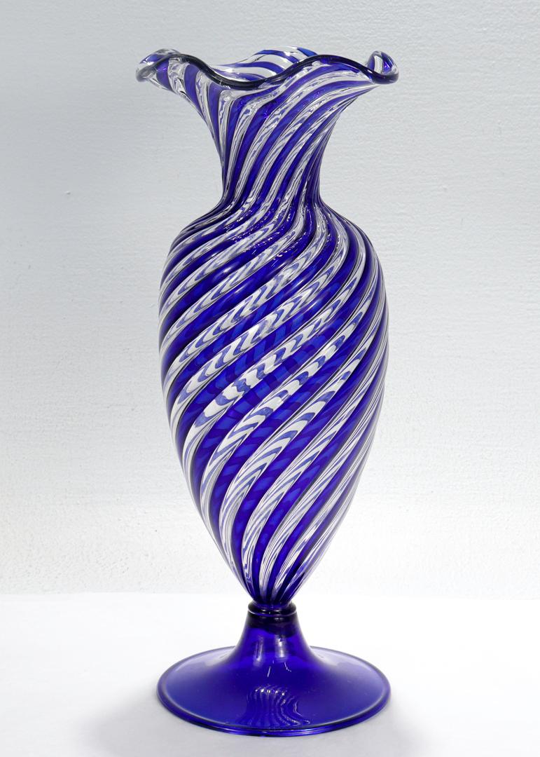 A fine Italian art glass vase.

Attributed to Salviati.

With a vasiform body and everted trumpet form base.

Simply a wonderful vase!

Date:
Mid-20th Century

Overall Condition:
It is in overall good, as-pictured, used estate condition