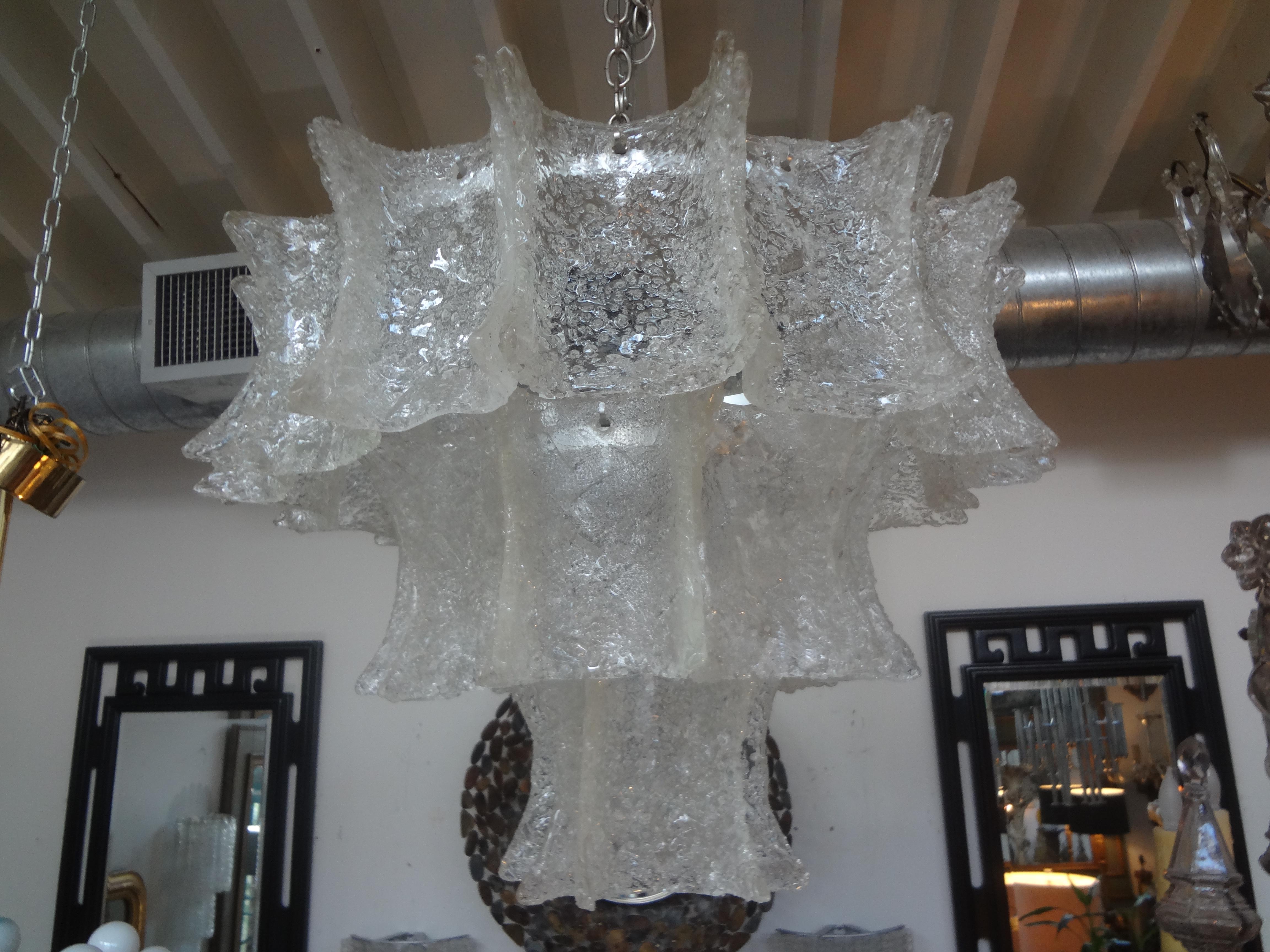 Mid-Century Modern Venini attributed Murano chandelier.
Mid-Century Modern Venini attributed Murano glass chandelier. 
This unusual Murano glass chandelier, lantern or pendant has been newly wired with new sockets for U.S application.
Height can
