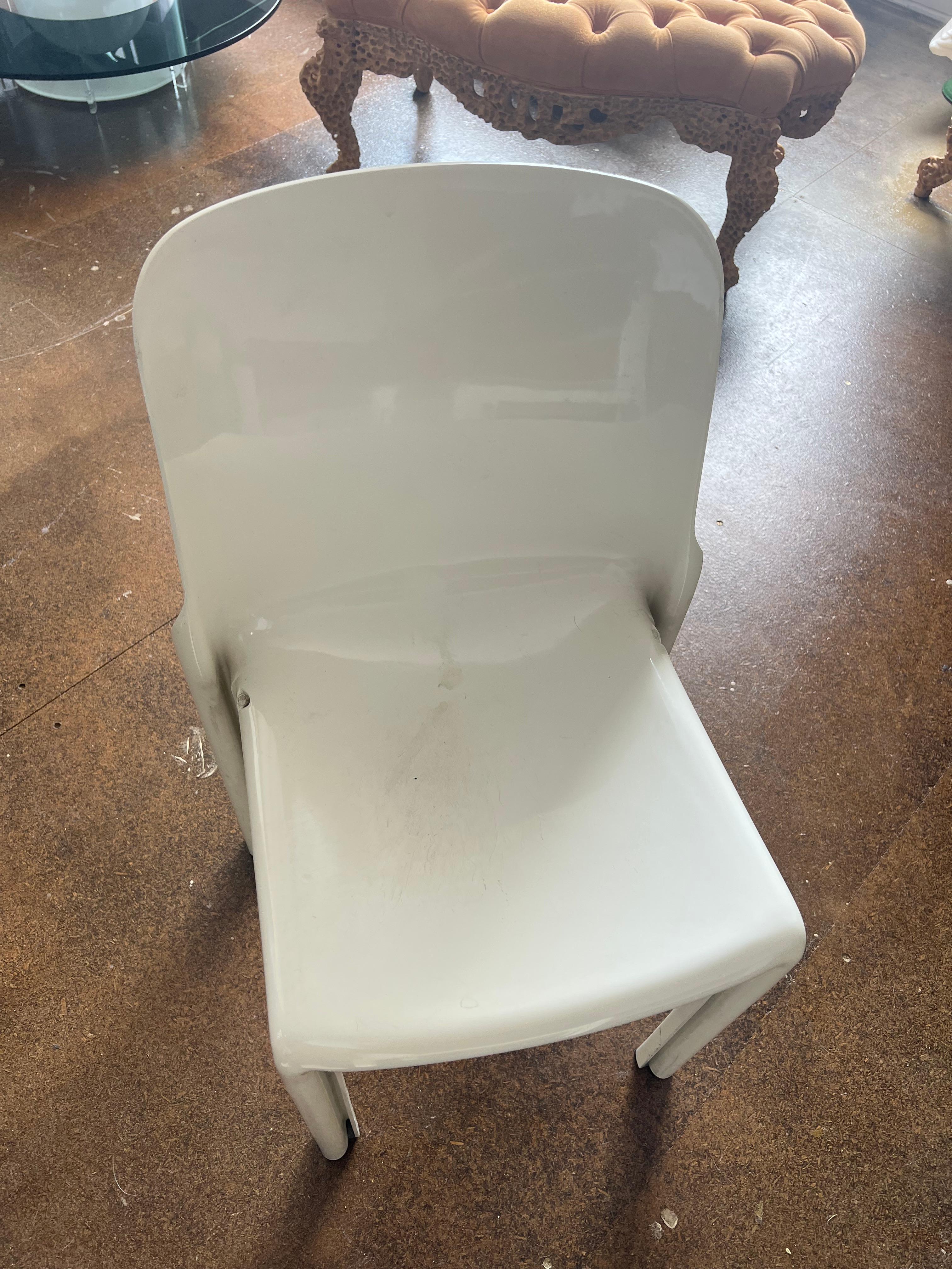 Set of two white Selene chairs .  
   