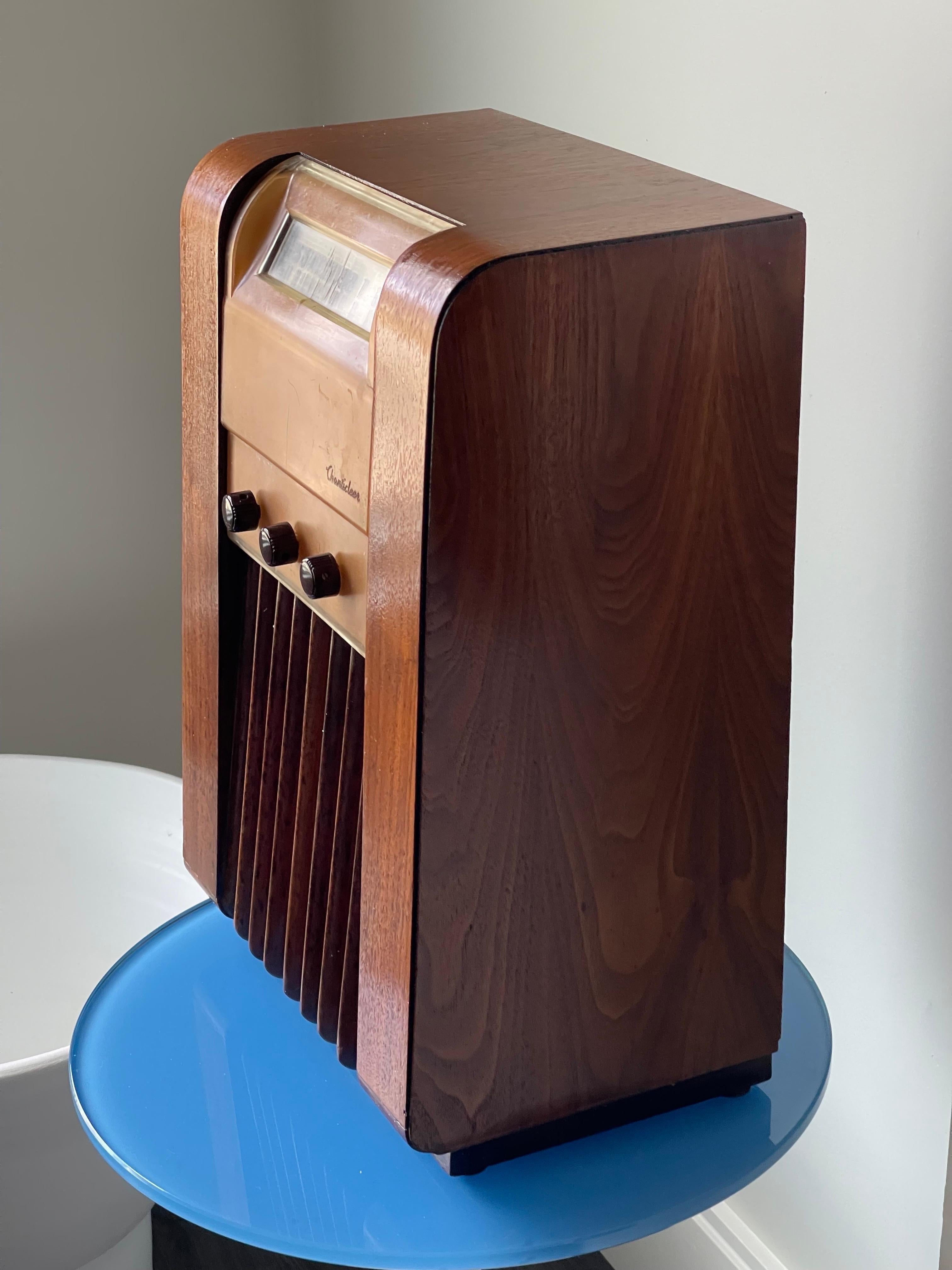 This radio was sold under several different labels such as Seiberling, Musicaire and Chanticleer. This one was sold as a Chanticleer, but made by Detrola. This model 576 is attributed to Alexander Girard since he was a radio designer there during