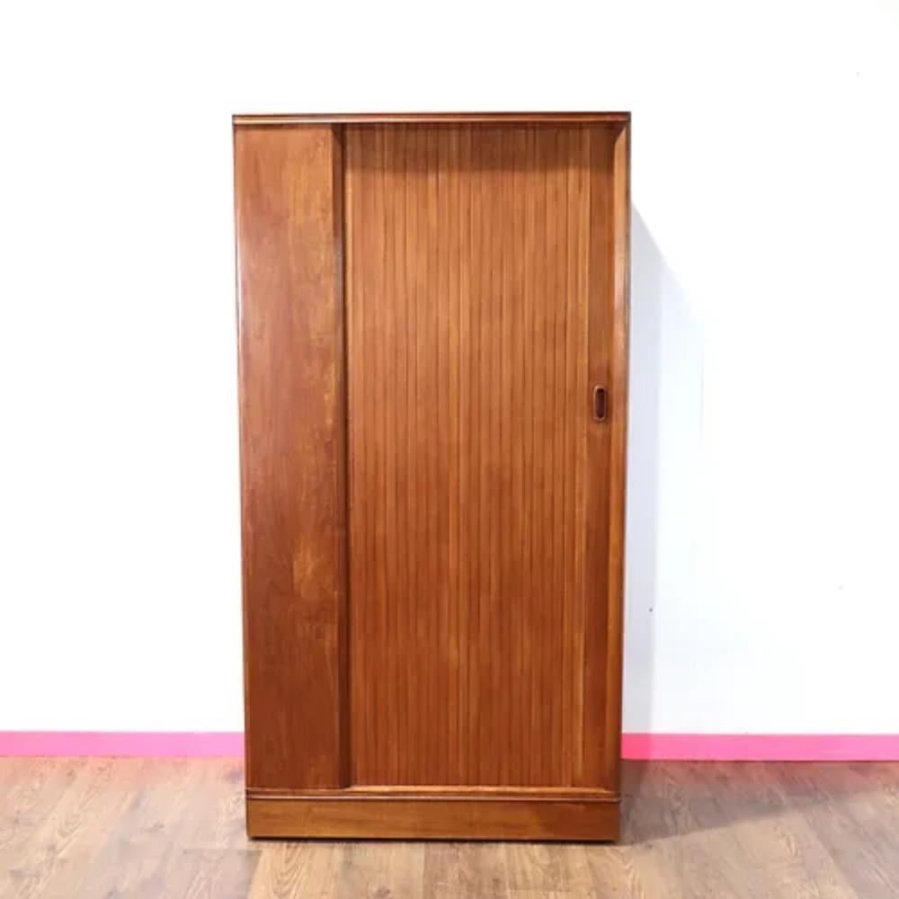 Introducing the stunning Mid Century Modern Vintage Armoire Teak Wardrobe by Austinsuite, a timeless piece that will elevate any bedroom or living space. Crafted by the renowned British furniture maker, Austinsuite, this armoire boasts impeccable