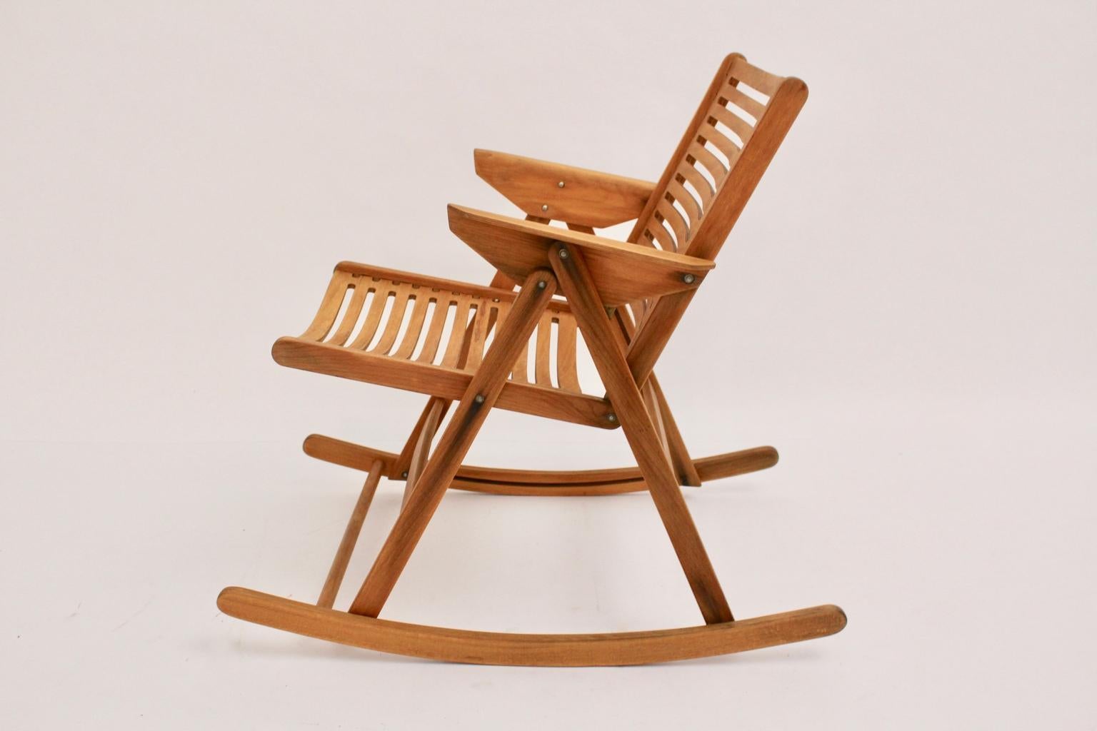 This presented rocking chair by Niko Kralj, 1950s Slovenia was made of solid beechwood and bent plywood with metal connections.
Also you can fold this rocking chair.
Very good vintage condition.
approx. measures:
Width: 58 cm
Depth: