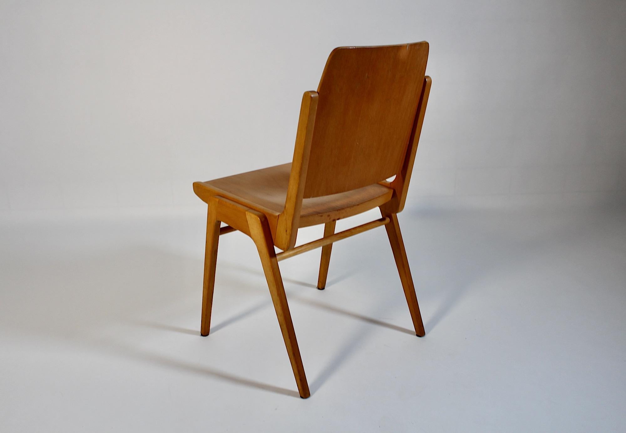 Mid Century Modern Vintage set of ten ( 10 ) Dining Chairs or Stacking Chairs in warm brown blond color by Franz Schuster 1959 Vienna for Wiesner Hager.
A beautiful set of ten dining room chairs or stacking chairs by Franz Schuster in warm and