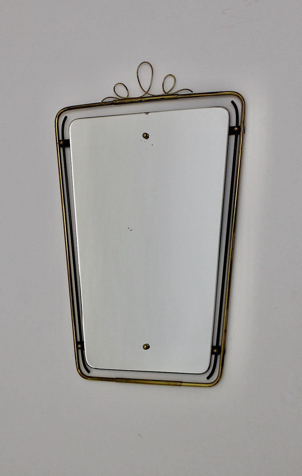 Mid-Century Modern Vintage Brass Black Metal Loop Wall Mirror, 1950s, Italy In Good Condition For Sale In Vienna, AT