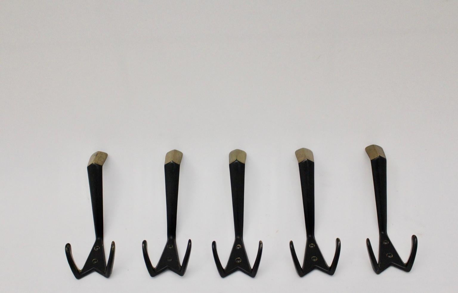 This set of five wall hooks were made of solid blackened brass.
Very good original vintage condition with minor signs of age.
Approx. measures:
Width: 6 cm
Depth: 8 cm
Height: 16 cm.