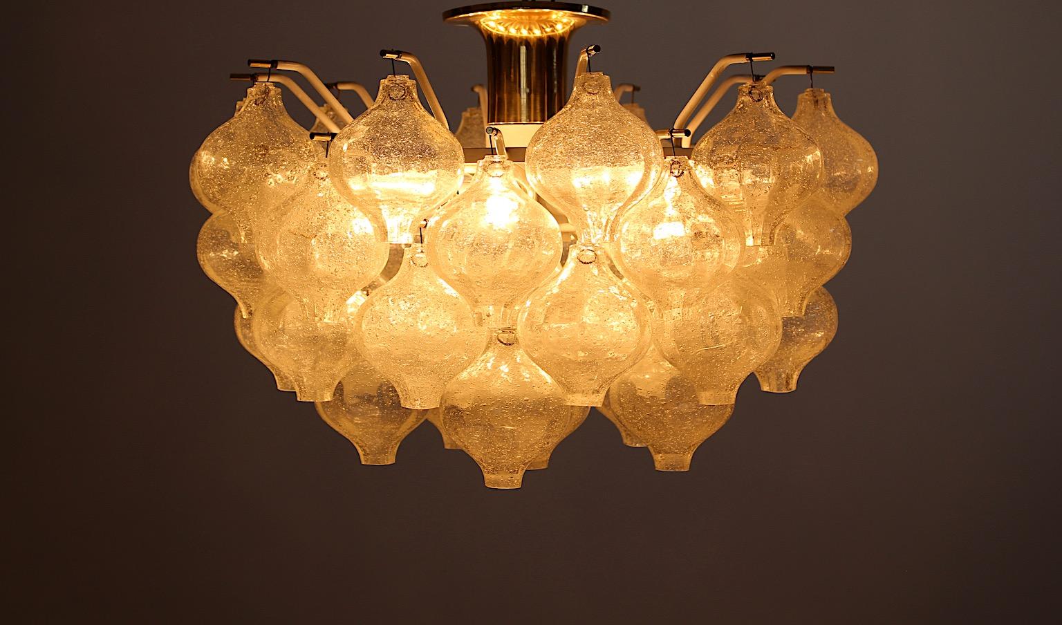 Mid Century Modern vintage flush mount or chandelier Tulipan from brass and glass by Kalmar Austria, Vienna, 1960s.
An amazing and delicate flush mount or chandelier with forty ( 40 ) 
handblown glass objects, which are fixed on the white lacquered