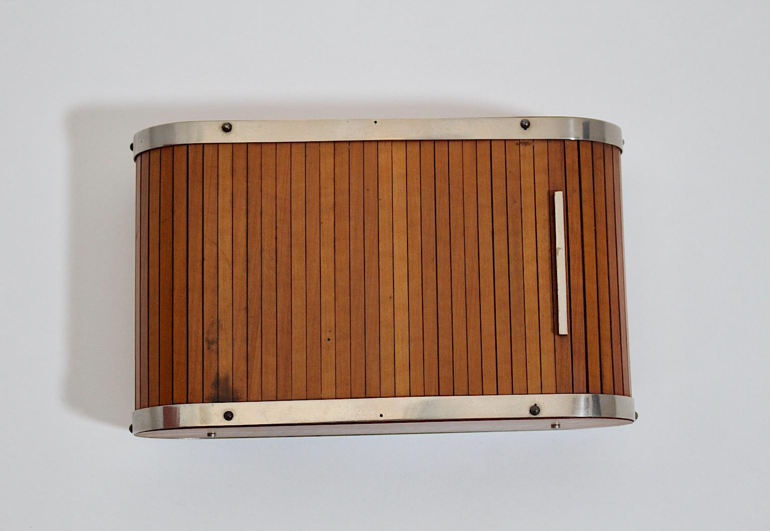 Mid-Century Modern vintage cigar box or table container for utensil from maple and nickel plated brass by Carl Auböck 1960s Vienna.
A stunning table container for utensils or cigar box from maple and nickel plated brass designed by Carl Auböck