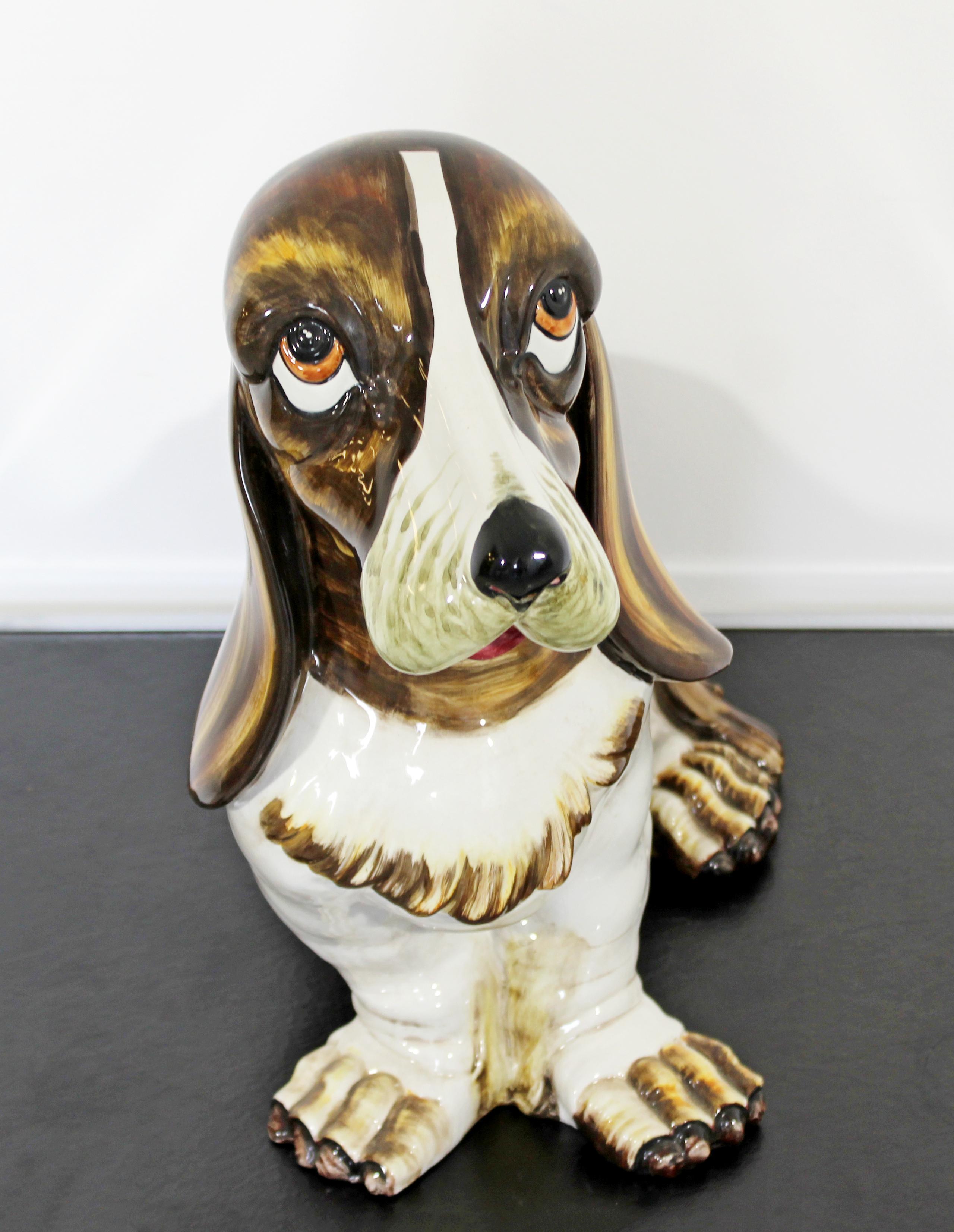 For your consideration is a gorgeous, ceramic sculpture of a life-sized Basset Hound, made in Italy, circa the 1950s. In excellent condition. The dimensions are 25