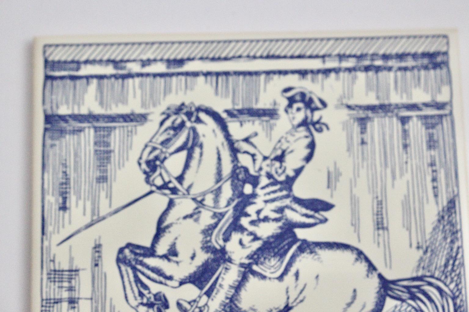 Mid-Century Modern vintage blue and white ceramic tile with motif.
Cavalier on Horseback 1960s, Austria.
A stunning ceramic tile with a printed motif in blue and white colors.
Labeled Made in Austria
Approx. measures:
Width 15.5 cm
Height 15.5