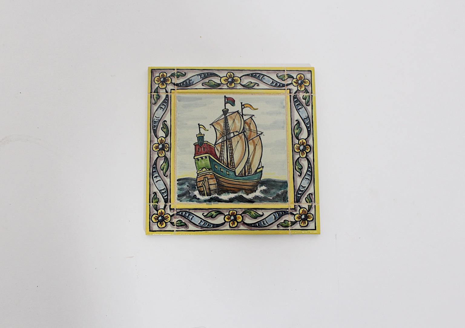 Mid-Century Modern vintage ceramic tile motif multicolored sail ship framed with flowers 1960s, Spain.
A stunning ceramic tile with a multicolored motif sail ship framed with flowers.
This tile comes from a private source, who collected these