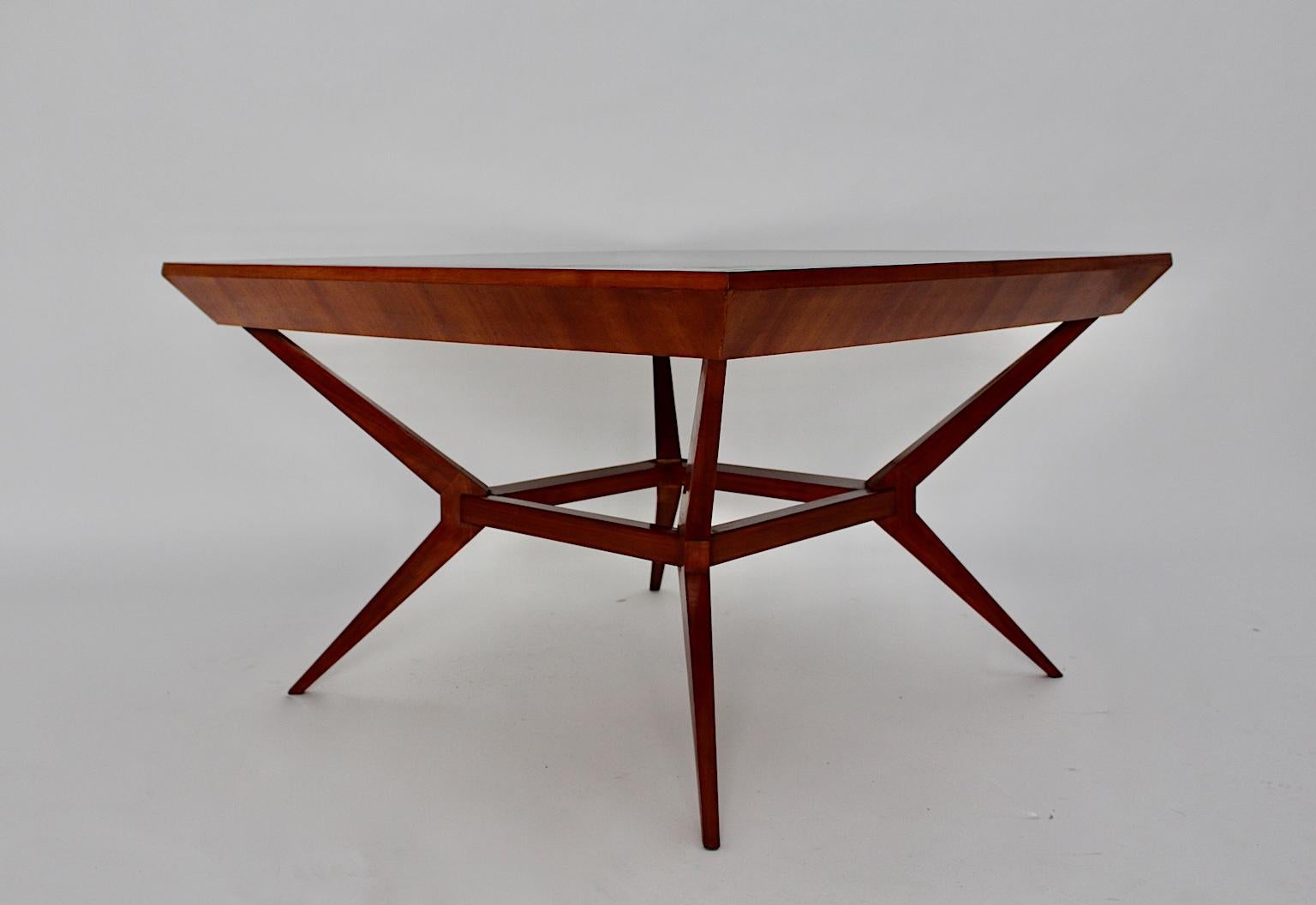 Mid-Century Modern vintage cherrywood dining table or center table from cherrywood and teal green formica plate design attributed to Franz Schuster Vienna, 1950s.
An outstanding dining table, which was designed and manufactured in the heart of
