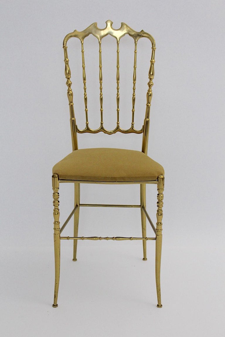 Mid-Century Modern vintage Chiavari brass side chair or chair, which was designed, 1950s, Italy.
The brass side chair is reupholstered and the seat is covered with light brown velvet.
Also the brass frame shows beautiful patina and is ready to be a