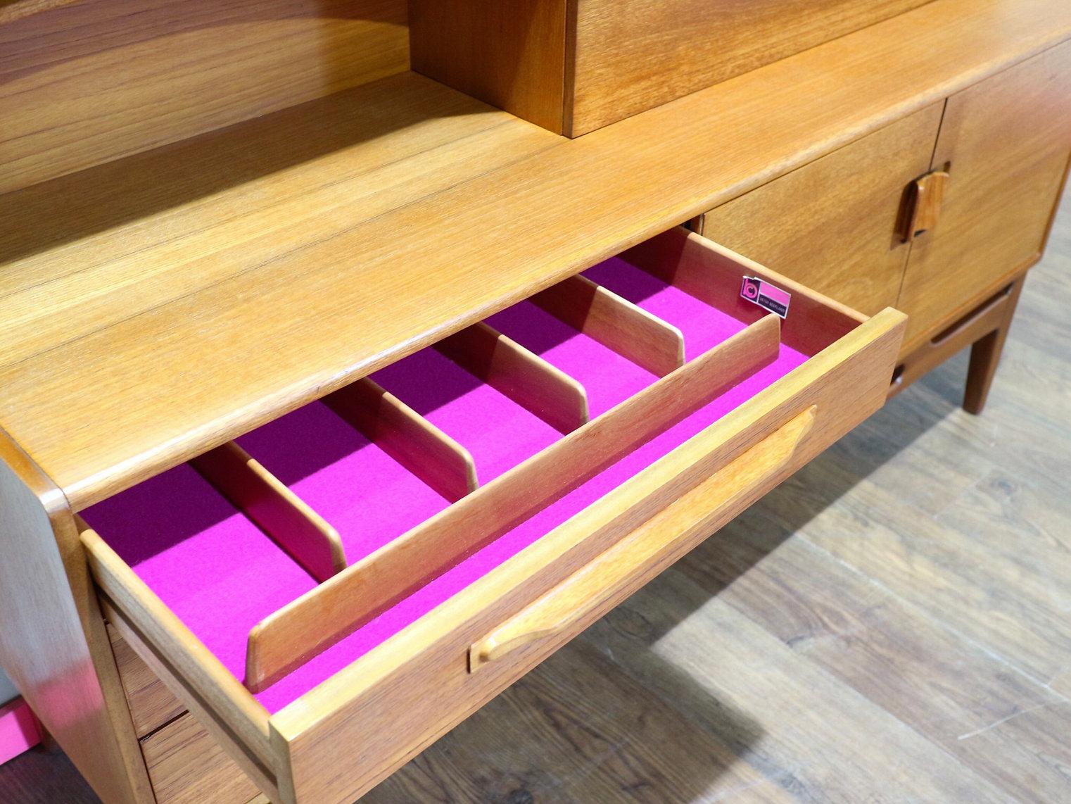 Discover a stunning credenza buffet cabinet by renowned Scottish furniture maker Beithcraft at Mid Century Traders. This exquisite piece boasts beautiful handles and offers great storage, seamlessly blending elegance with functionality. Perfect for