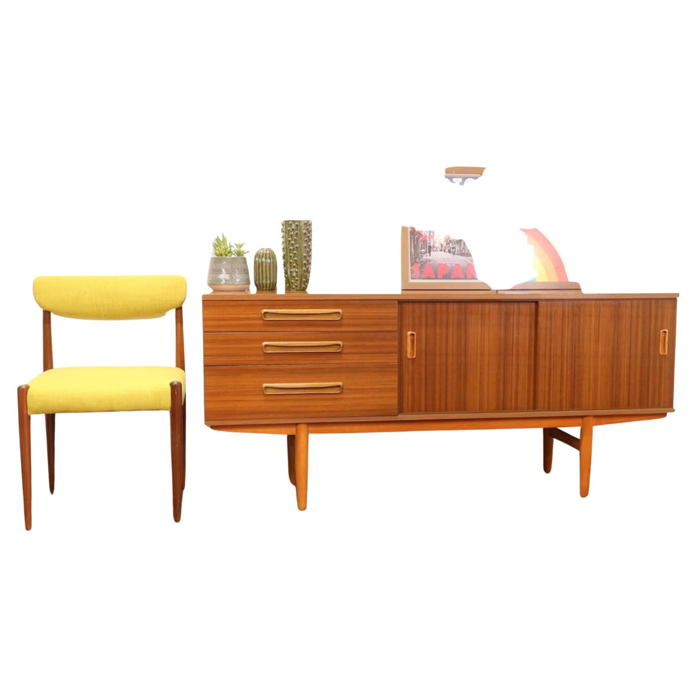 A wonderful example of a mid century credenza by British furniture maker Avalon.

This great credenza offers great storage and will look great in any surrounding.

Dimensions

W 63 D 17.5 H 28.5

Condition

This sideboard is in great all