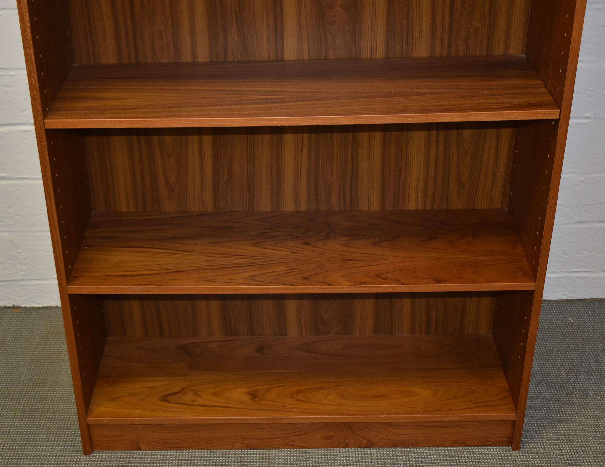 Mid-Century Modern vintage Danish teak five adjustable shelf bookcase. Measures: 36