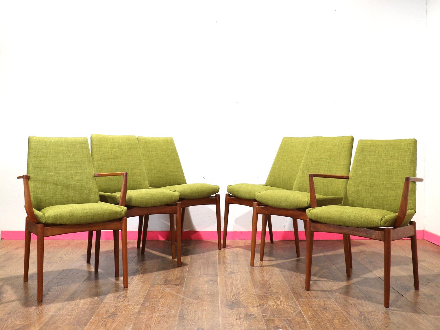 Discover this stunning set of six chairs by renowned British furniture maker Robert Heritage, including two carver chairs.  Meticulously crafted in the iconic mid-century modern style by Archie Shine, these dining chairs epitomize timeless elegance