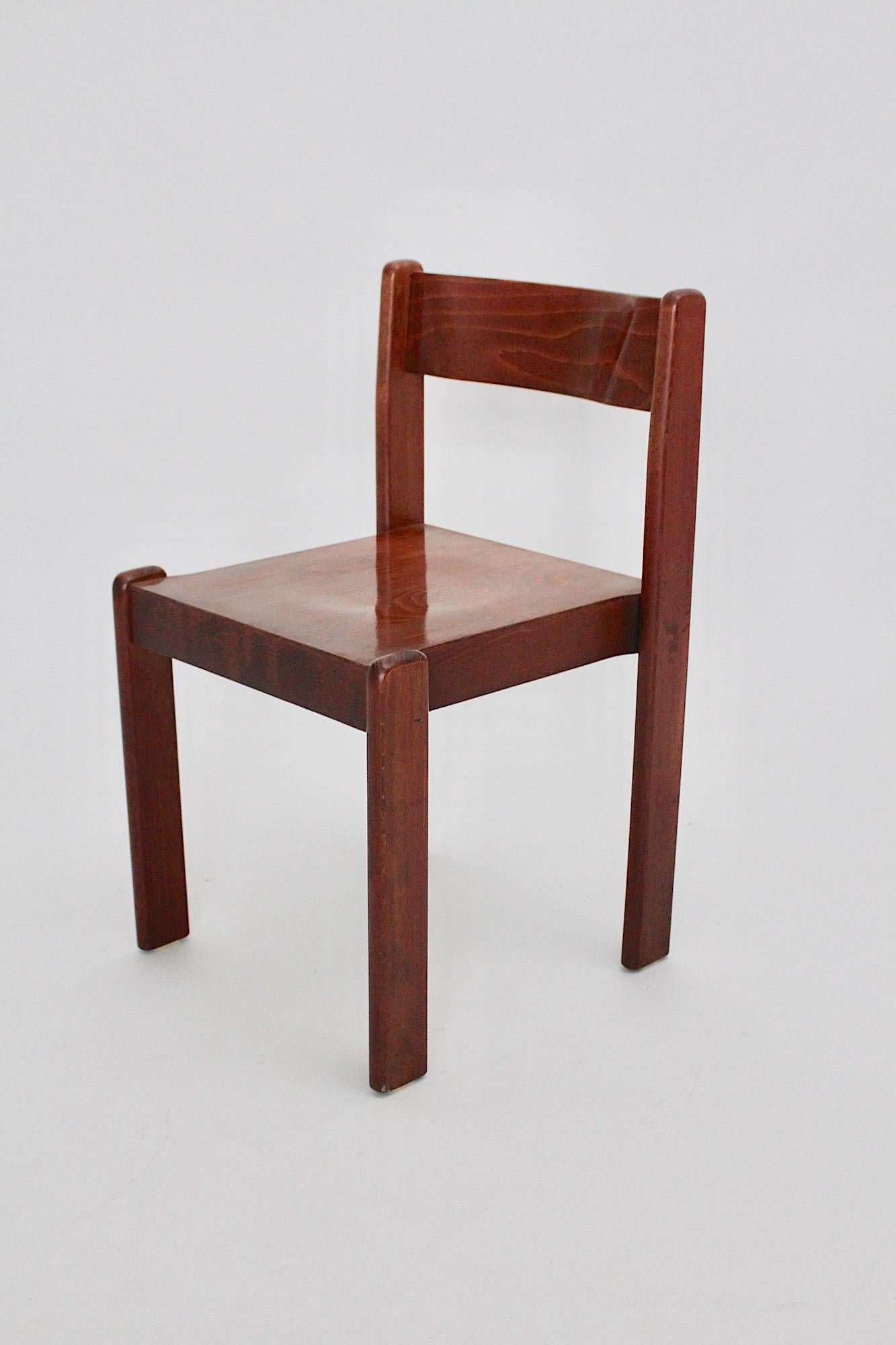 Mid Century Modern vintage beech dining chairs or chairs chocolate brown stained designed and manufactured Italy 1970s, up to nineteen ( 19 ) chairs.
A great dining chair with a brown stained and natural lacquered surface in a quantity up to