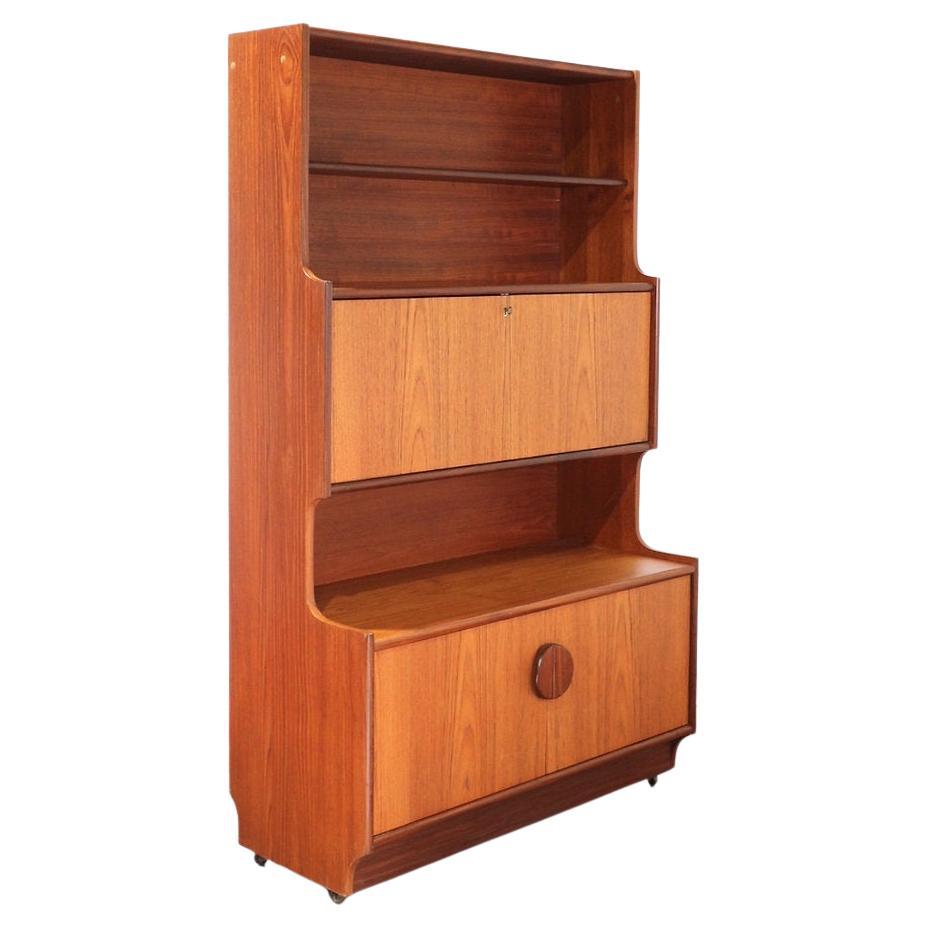 Discover the epitome of sophistication with this Mid Century Modern Vintage Display China Cabinet Bookcase by Portwood, a fabulous piece crafted by the renowned British furniture maker. Great storage space is seamlessly combined with gorgeous