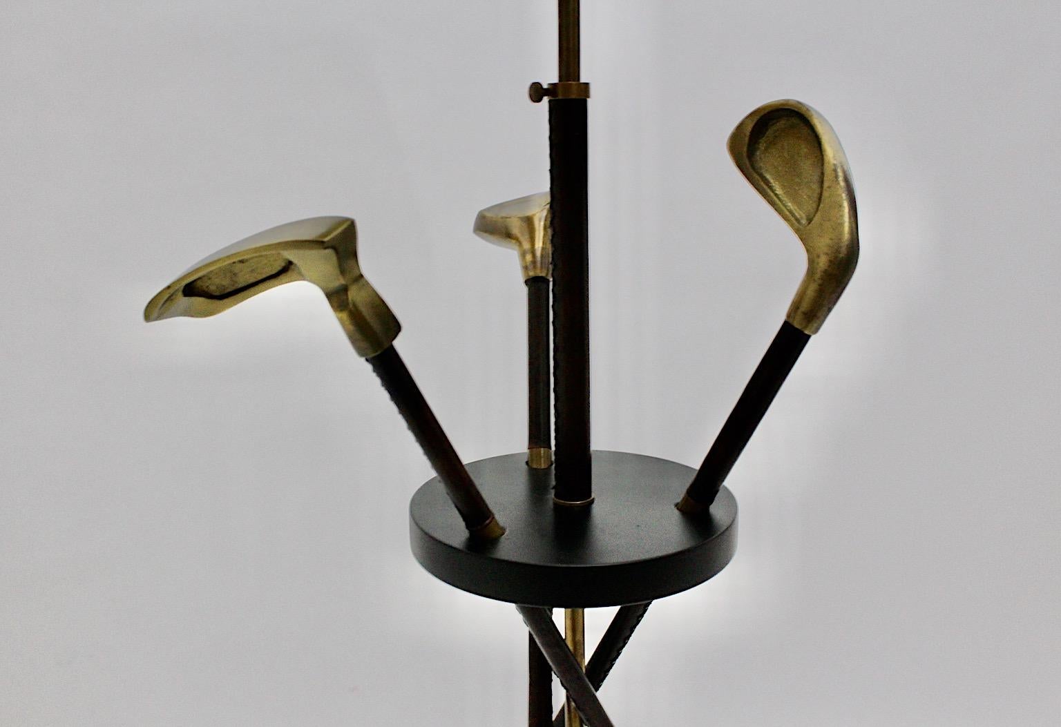 Mid Century Modern vintage golf club floor lamp from stitched leather and brass attributed to Jacques Adnet 1940s France.
An extraordinary high quality vintage golf club floor lamp attributed to Jacques Adnet 1940s France wrapped with stitched