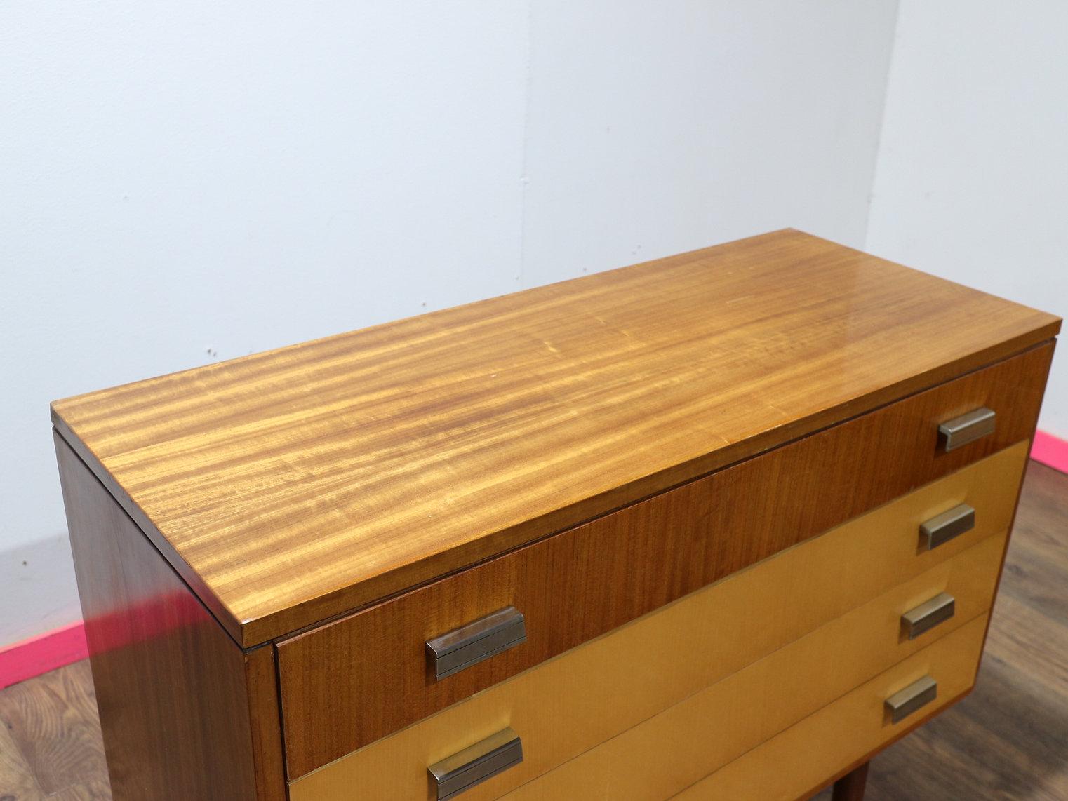 A gorgeouse dresser by Italian furniture maker Marino, this Mid Century Modern Vintage Maple Italian Dresser showcases stunning quality and mid century style, making it a true statement piece for any home. At Mid Century Traders, we pride ourselves
