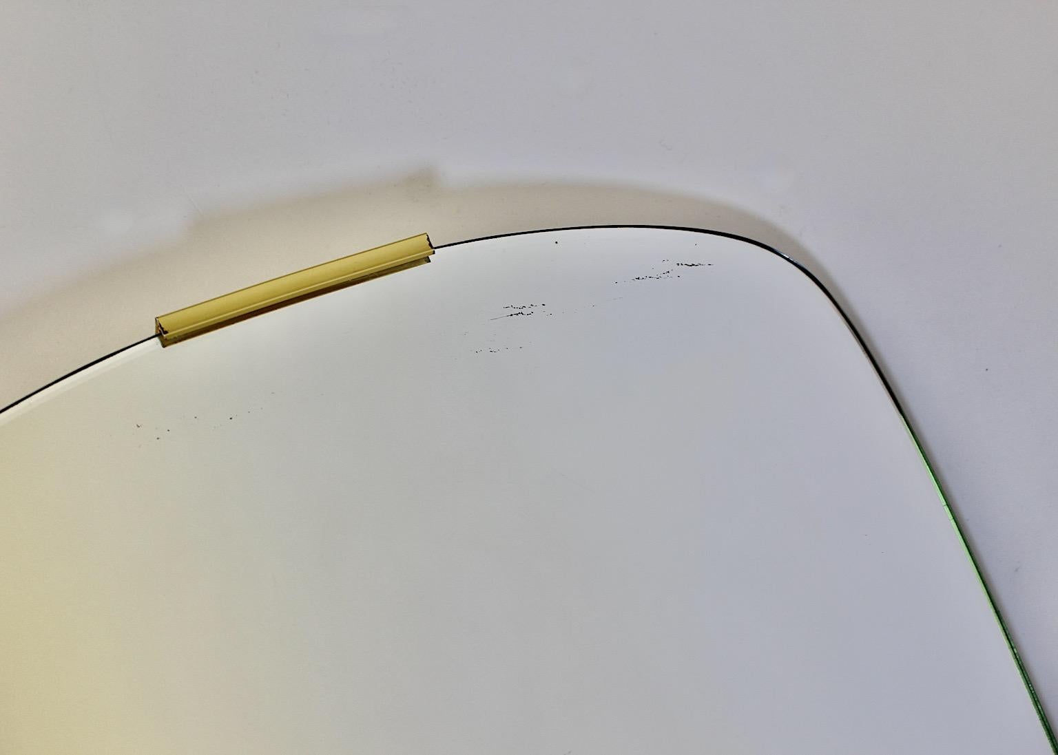 Mid Century Modern Vintage Oval Floor Mirror Frameless Brass Clasps 1950s Italy In Good Condition For Sale In Vienna, AT