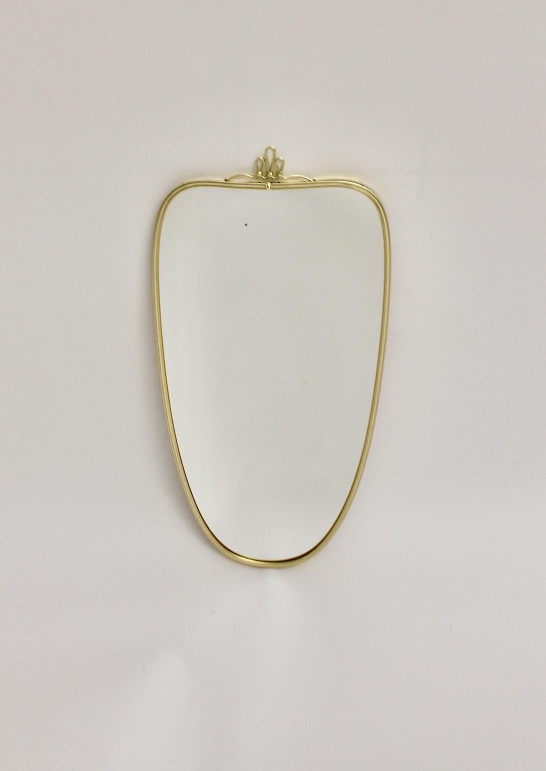 Italian Modernist Vintage Oval Golden Metal Wall Mirror 1950s Italy For Sale