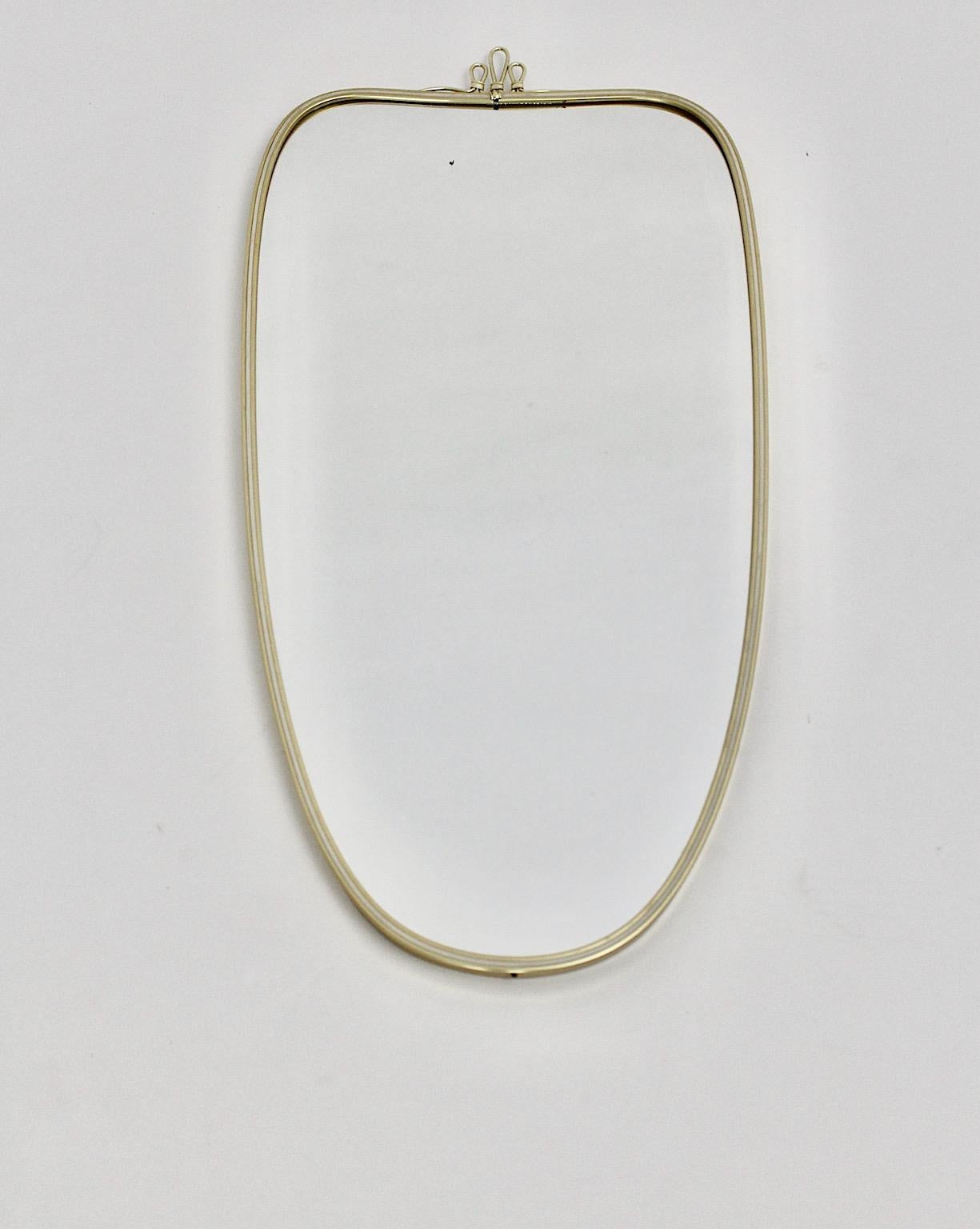 Modernist Vintage Oval Golden Metal Wall Mirror 1950s Italy In Good Condition For Sale In Vienna, AT