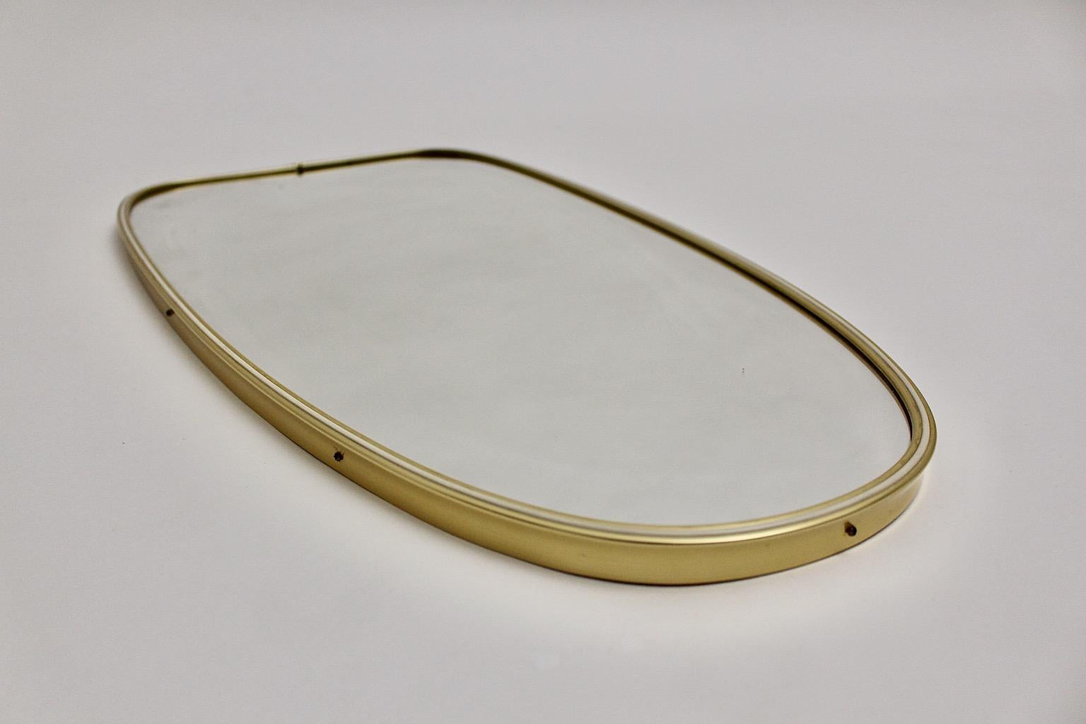 20th Century Modernist Vintage Oval Golden Metal Wall Mirror 1950s Italy For Sale