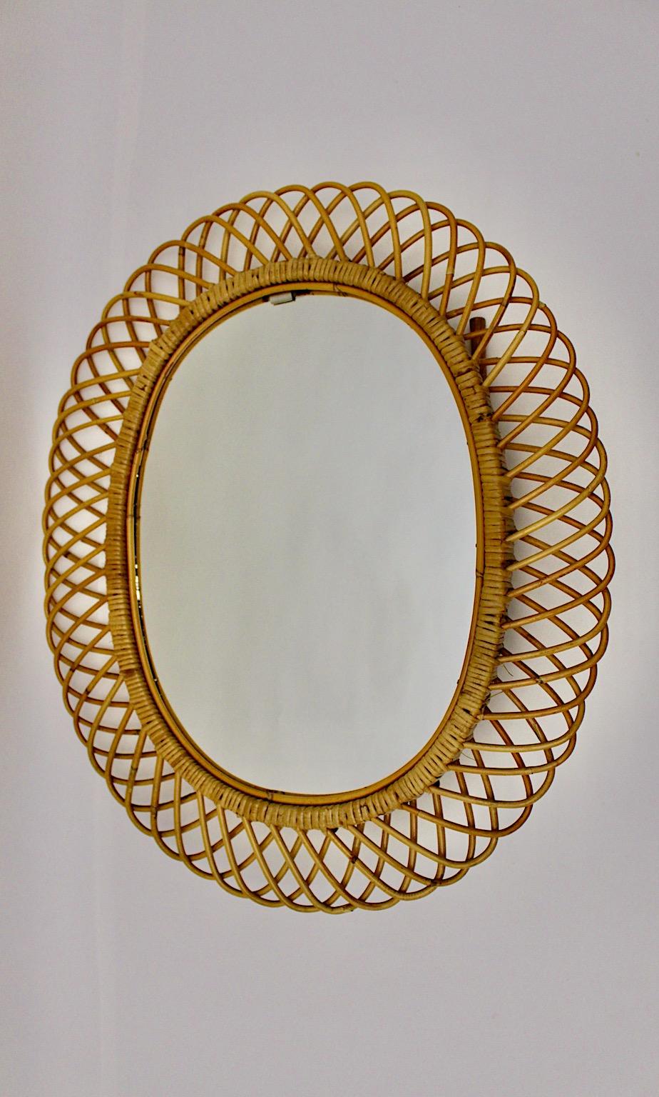 Italian Mid-Century Modern Vintage Oval Sunburst Mirror Wall Mirror Rattan, Italy, 1960s For Sale