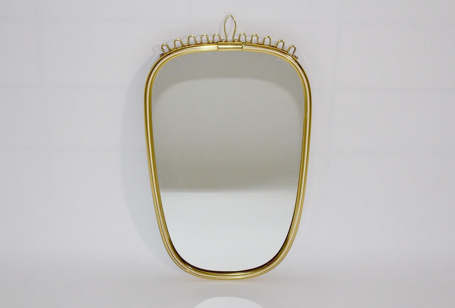 Mid-20th Century Mid-Century Modern Vintage Brass Oval Wall Mirror, 1960s, Germany For Sale