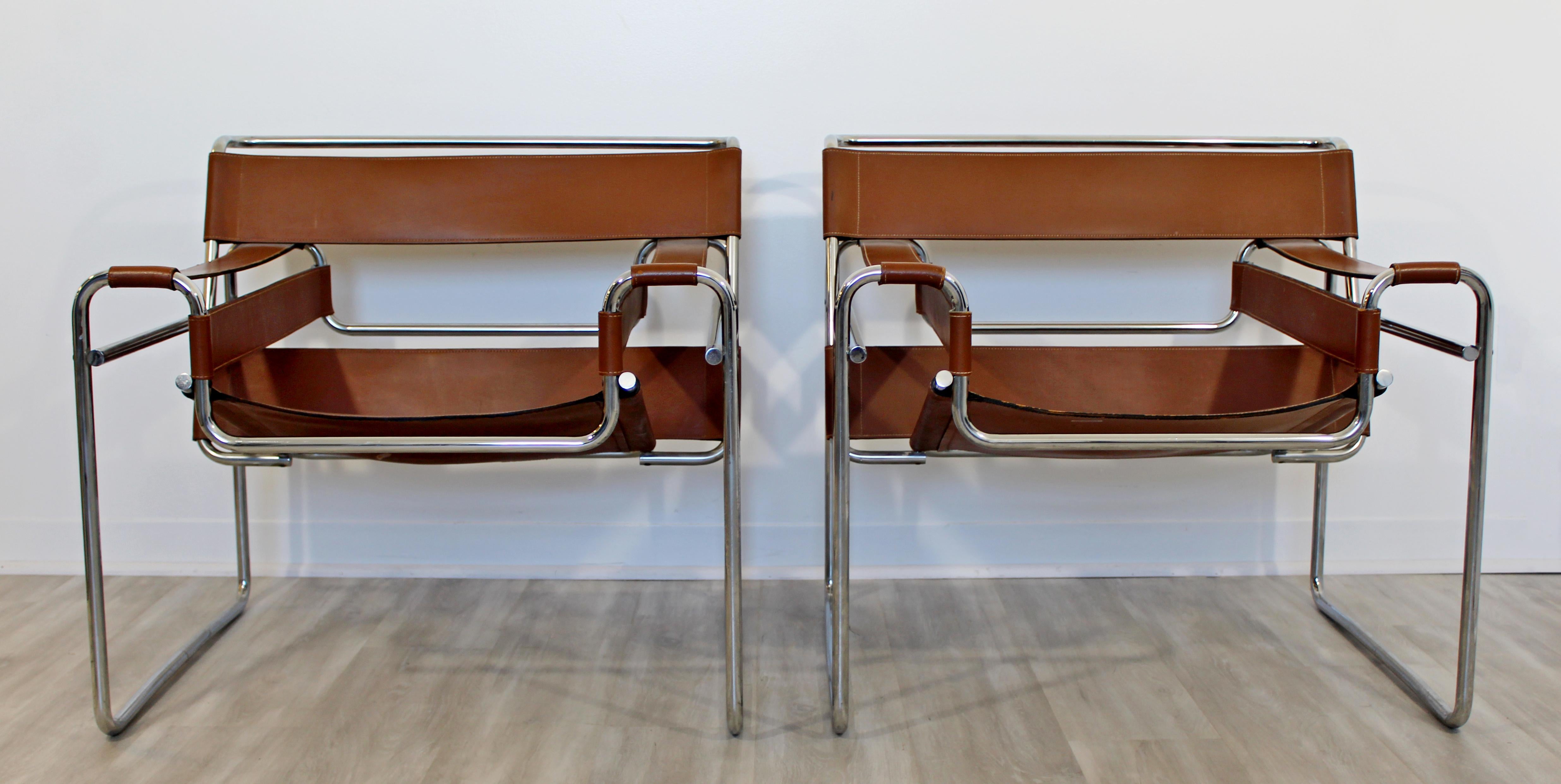 For your consideration is a marvelous, early pair of chrome and brown leather Wassily armchairs, by Marcel Breuer for Stendig Italy, circa 1950s. In very good vintage condition. The dimensions are 30.5