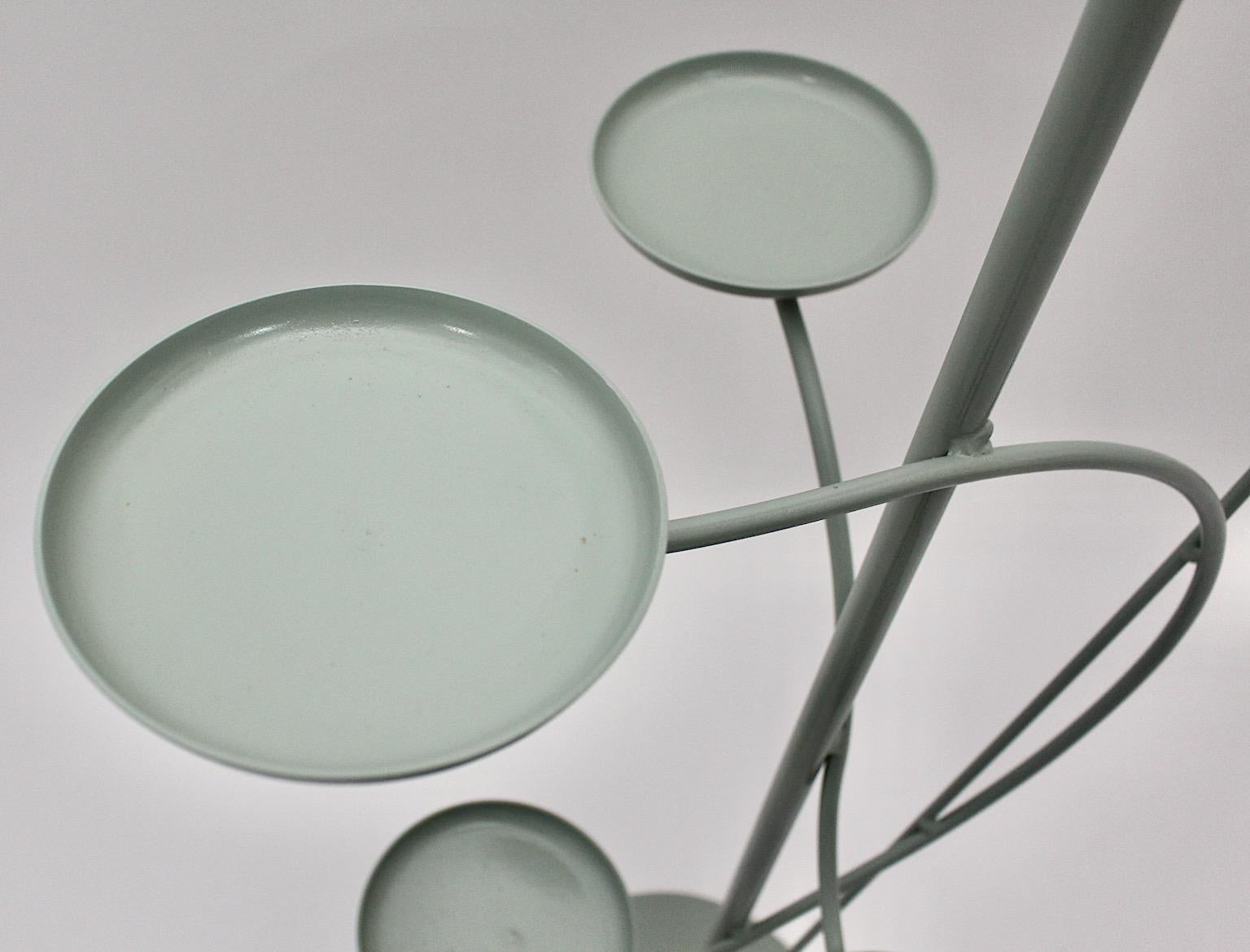 Lacquered Mid Century Modern Vintage Pastel Green Metal Flower Stand Flower Rack 1950s For Sale