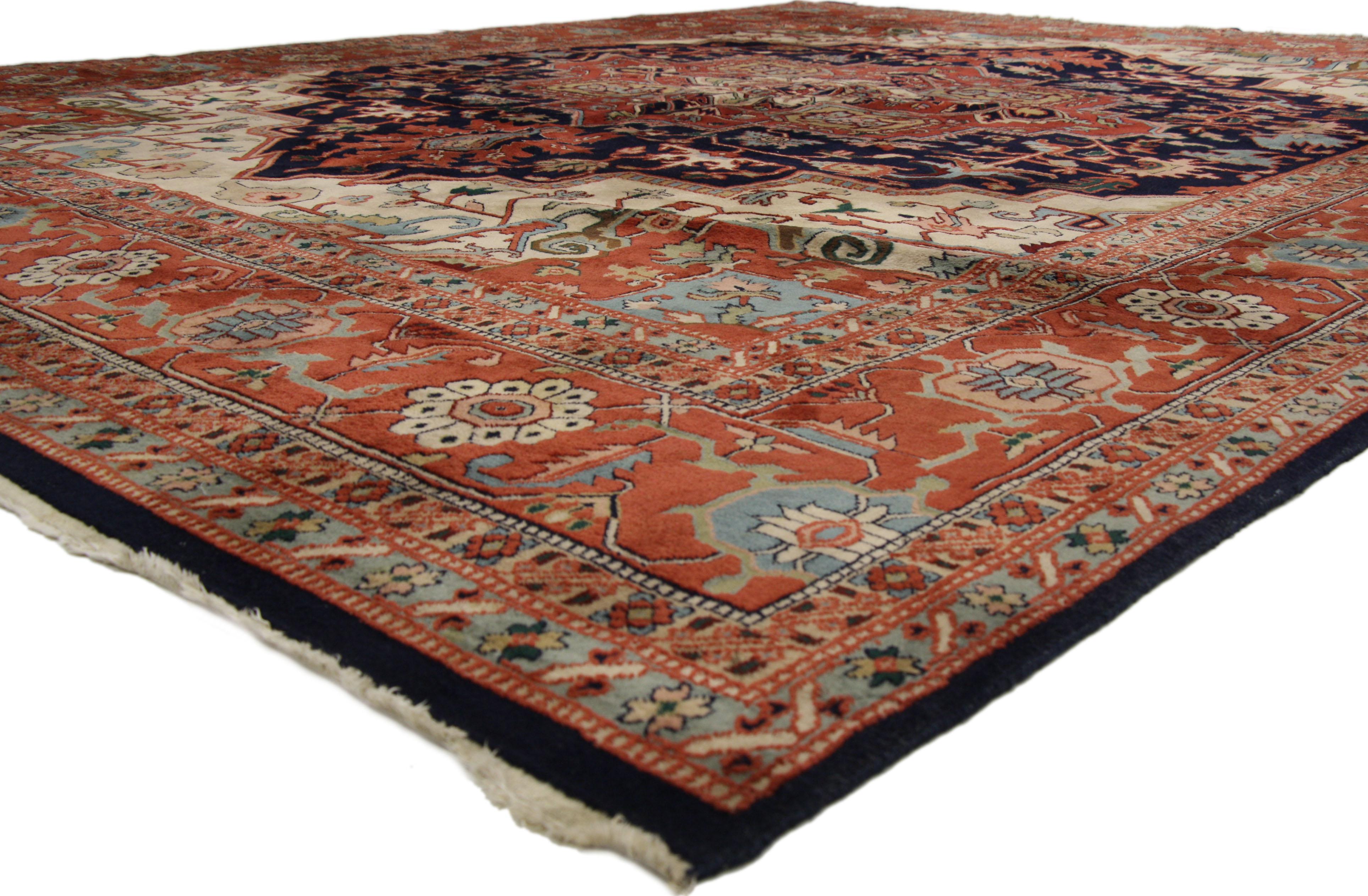 74402 Vintage Persian Heriz Rug with Modern English Manor Style. Traditional and regal with brilliant color, this hand knotted wool vintage Persian Heriz rug is comprised of a prominent octogonal medallion flanked with two dramatic pendants floating