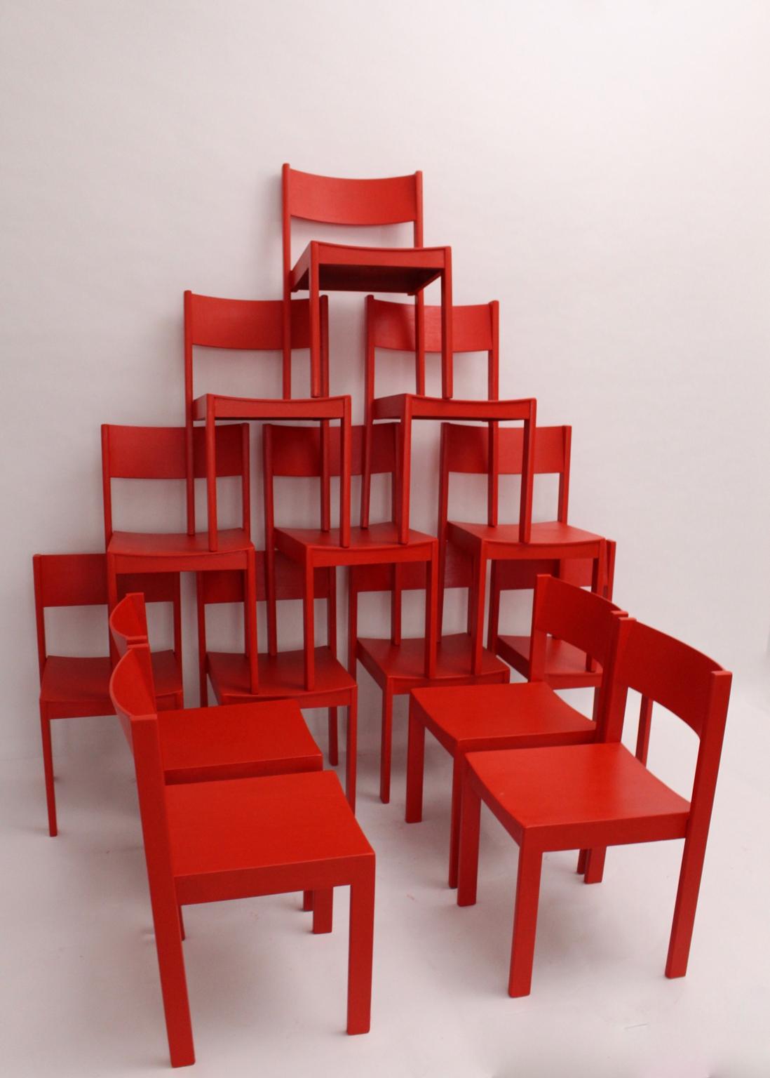 A rare set of 14 red stackable dining room chairs, which was made out of solid beechwood and plywood.
The dining chairs have been cleaned and newly red lacquered.
Carl Auböck designed the dining chairs for the Anna Boschek dormitory, 1965, Vienna