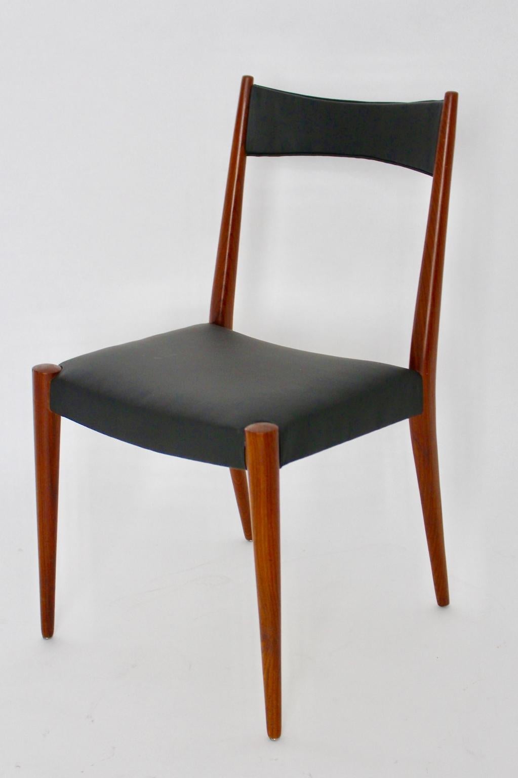 Mid century Modern vintage solo chair designed by Anna-Lülja Praun 1953, Austria and executed by Wiesner-Hager, Austria.
The seat and the back show a renewed black faux leather cover.
So the vintage condition is very good.
Approximate