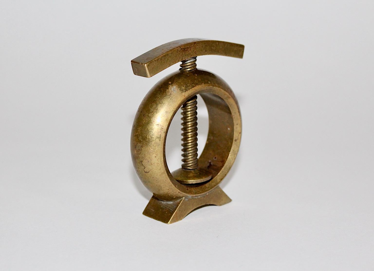 Mid Century Modern vintage nut cracker from solid brass designed and executed Austria 1950s.
Amazing simple design in great execution highlights this nut cracker.
Very rare to find such an amazing design piece in its in the original paper case.