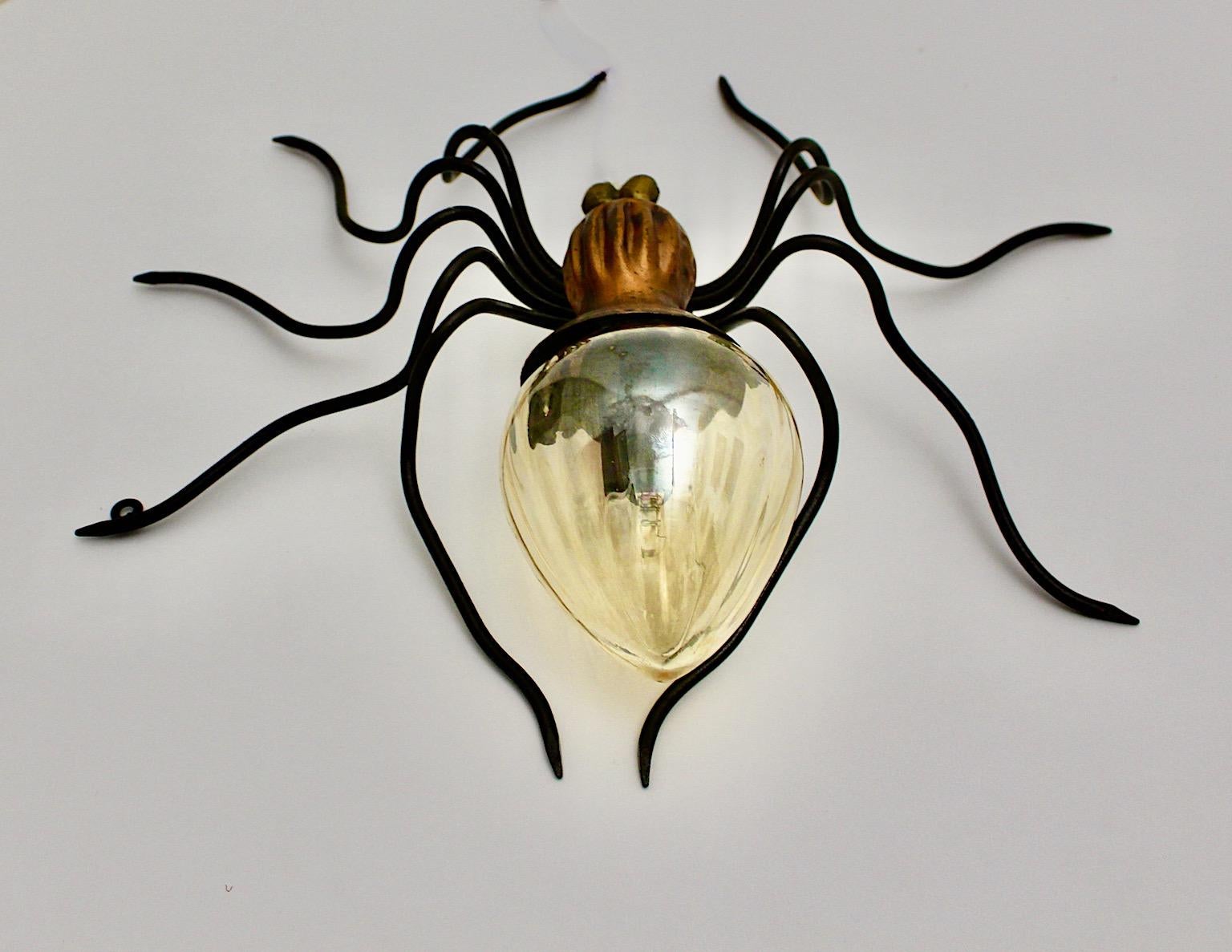 Mid-Century Modern Vintage Flush Mount or table lamp Spider like from copper, metal and blown glass 1950s Italy.
A whimsical spider like flush mount wall lighting or table lamp with copper and metal, while the body formed from yellow blown