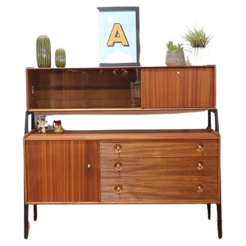 A stunning cabinet made by British furniture maker Nathan in the 1960s.  This crednza offers great storage as well as looking elegant with its two tier cabinets it would look fantastic in any room