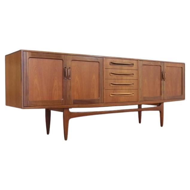This fabulous G Plan credenza is part of the fresco range and designed by V B Wilkins around 1965. This is a classic british credenza with danish style making it one of the most popular credenza made by G plan, a real statement piece 

The Credenza
