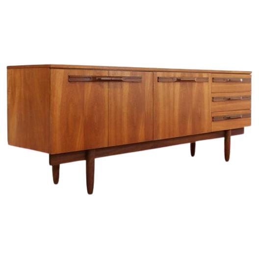 A stunning credenza by Britiish furniture make Beautility.  This sideboard offers plenty of storage whilst looking stunning.  It has a fantastic grain that really makes it shine! 

Dims
w78.5 d18.5 h28.5 

Condition
This credenza is in great all