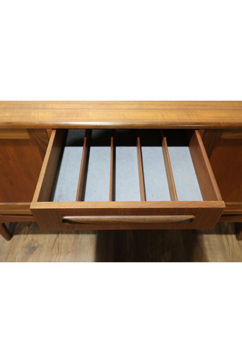 This fabulous G Plan credenza is part of the fresco range and designed by V B Wilkins around 1965. This is a classic british credenza with danish style making it one of the most popular credenza made by G plan, a real statement piece

 

The