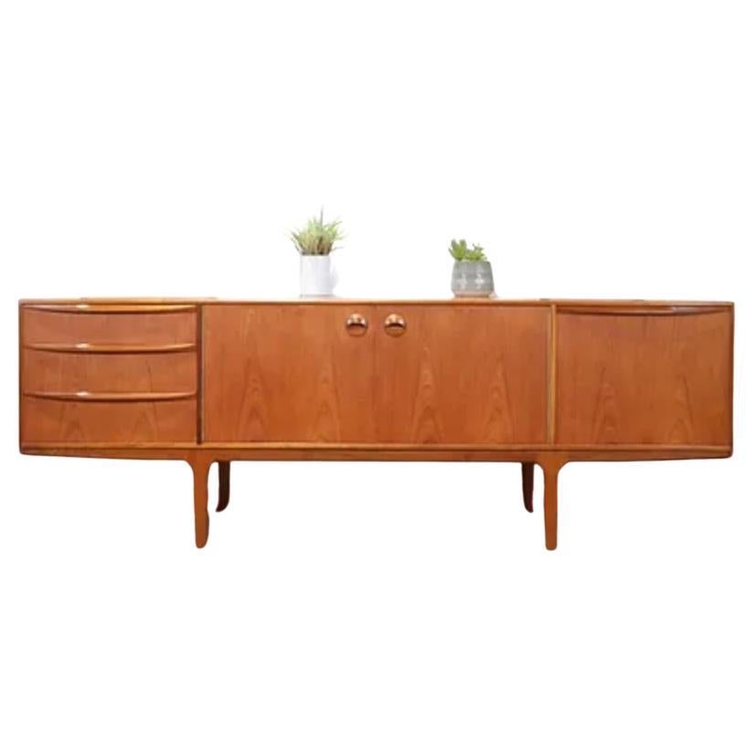 A Mid Century Vintage McIntosh 'Dunfermline' Sideboard

A lovely Mcintosh vintage 'Dunfermline' sideboard designed by Tom Robertson sideboard circa 1970. 

Mcintosh of Kirkcaldy in Scotland made the 'Dunfermline' sideboard for over a decade and it
