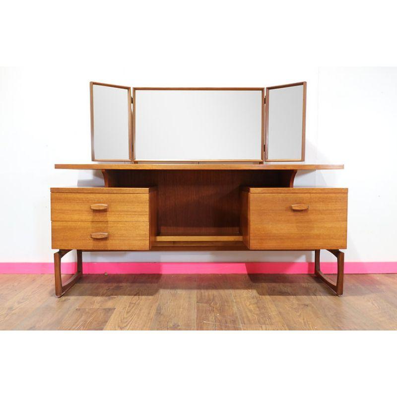 A truly stunning mid century vanity by G plan as part of the Quadrille range.  This fantatic piece of furniture can be used as it was orignally designed as a vanity with its tripple adjustable mirrors and drawers or it can also be used as a desk,