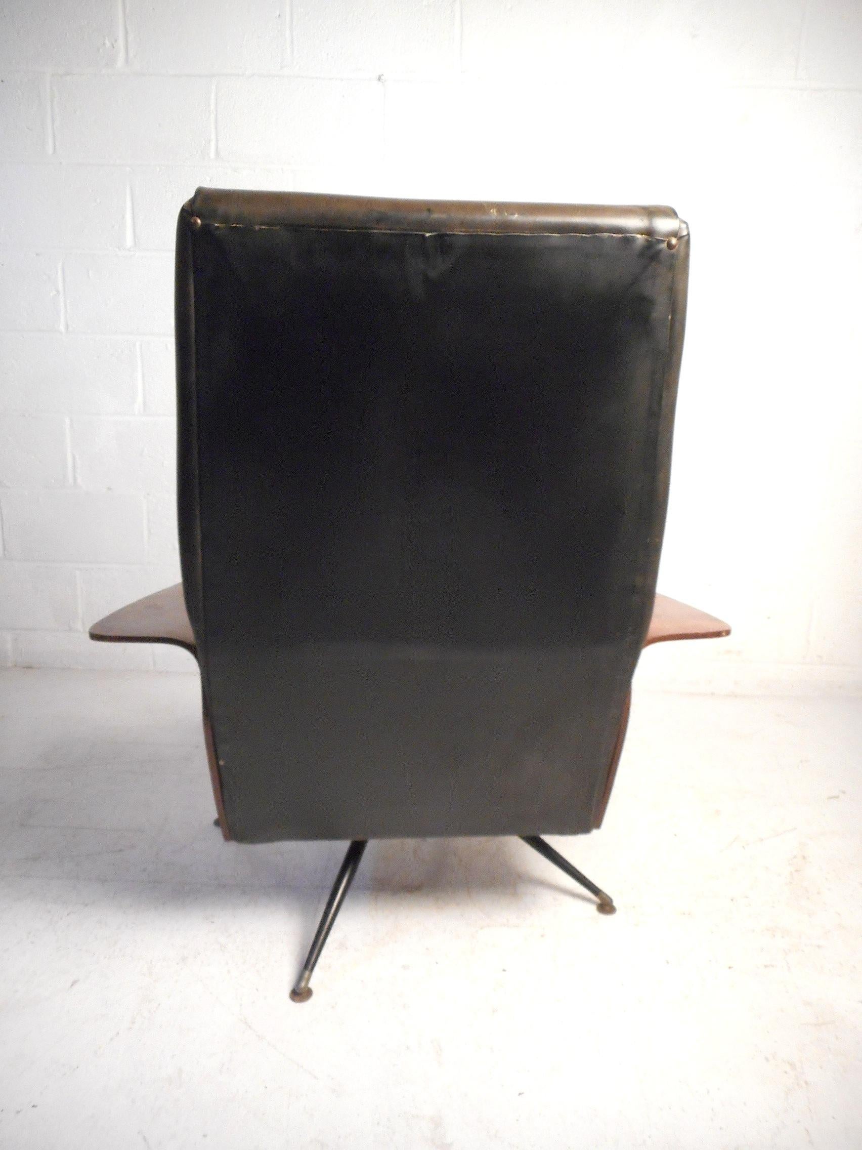 Mid-Century Modern Vinyl Swivelling Chair and Ottoman 1