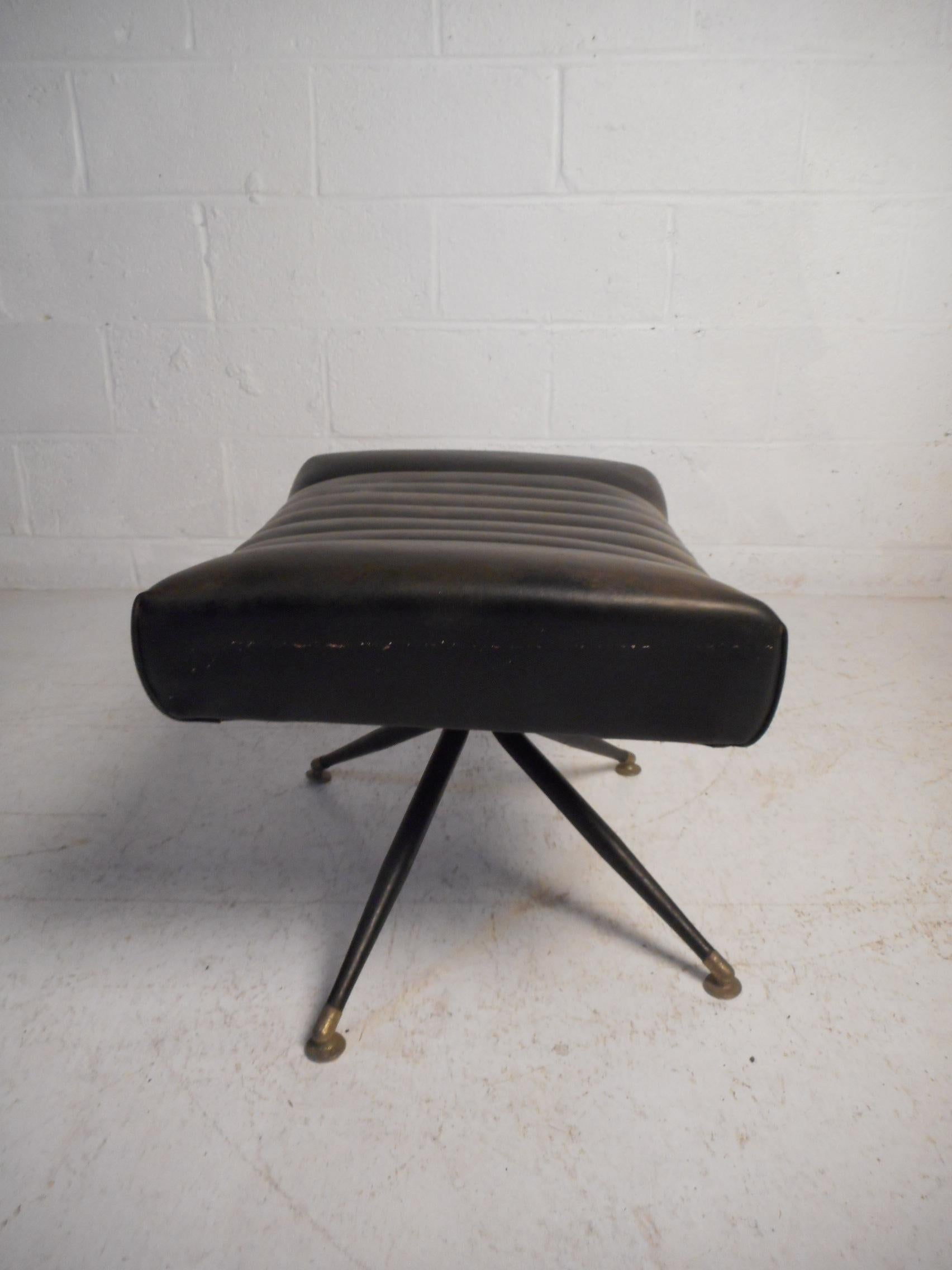 Mid-Century Modern Vinyl Swivelling Chair and Ottoman 5