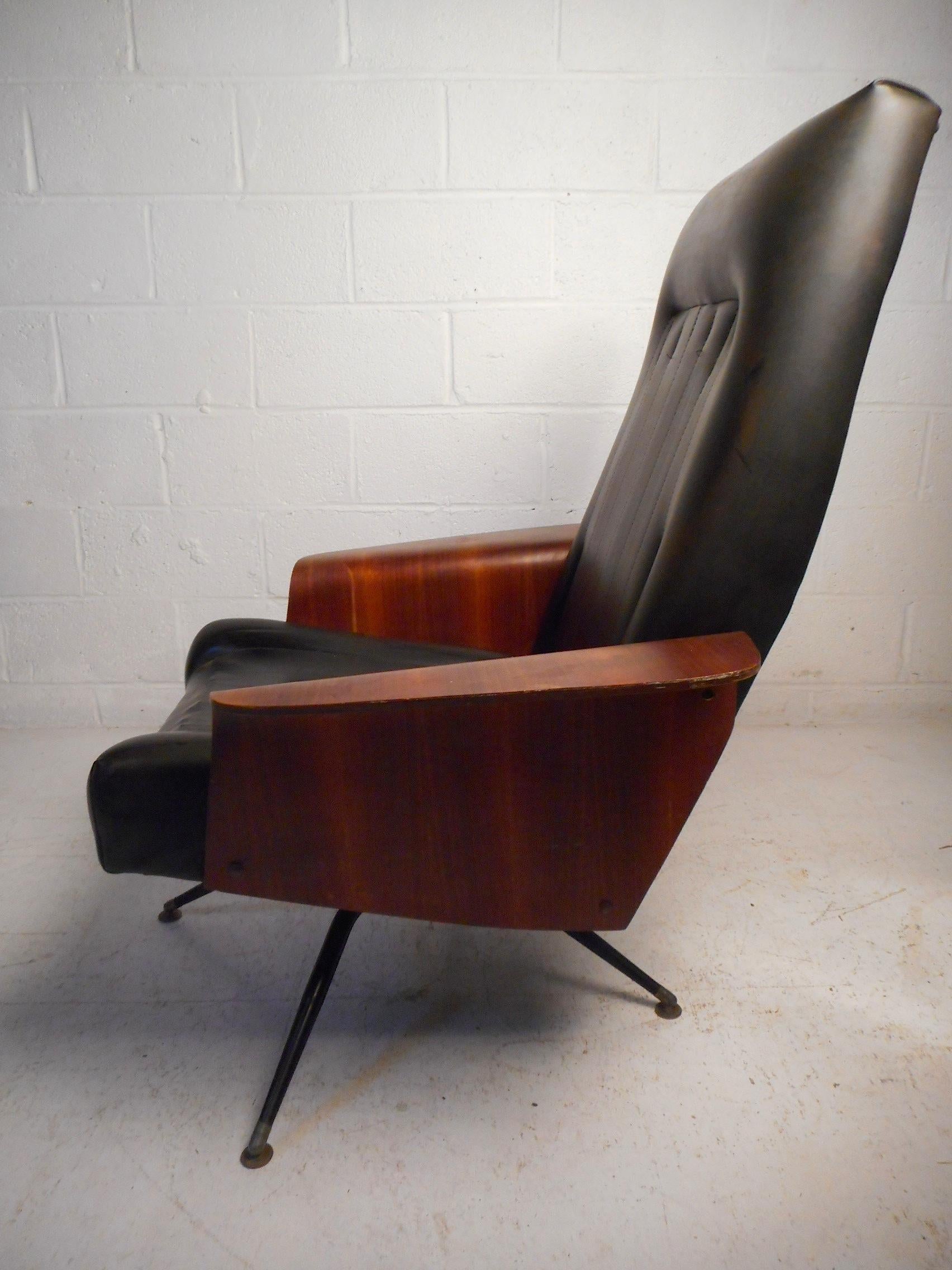 Late 20th Century Mid-Century Modern Vinyl Swivelling Chair and Ottoman