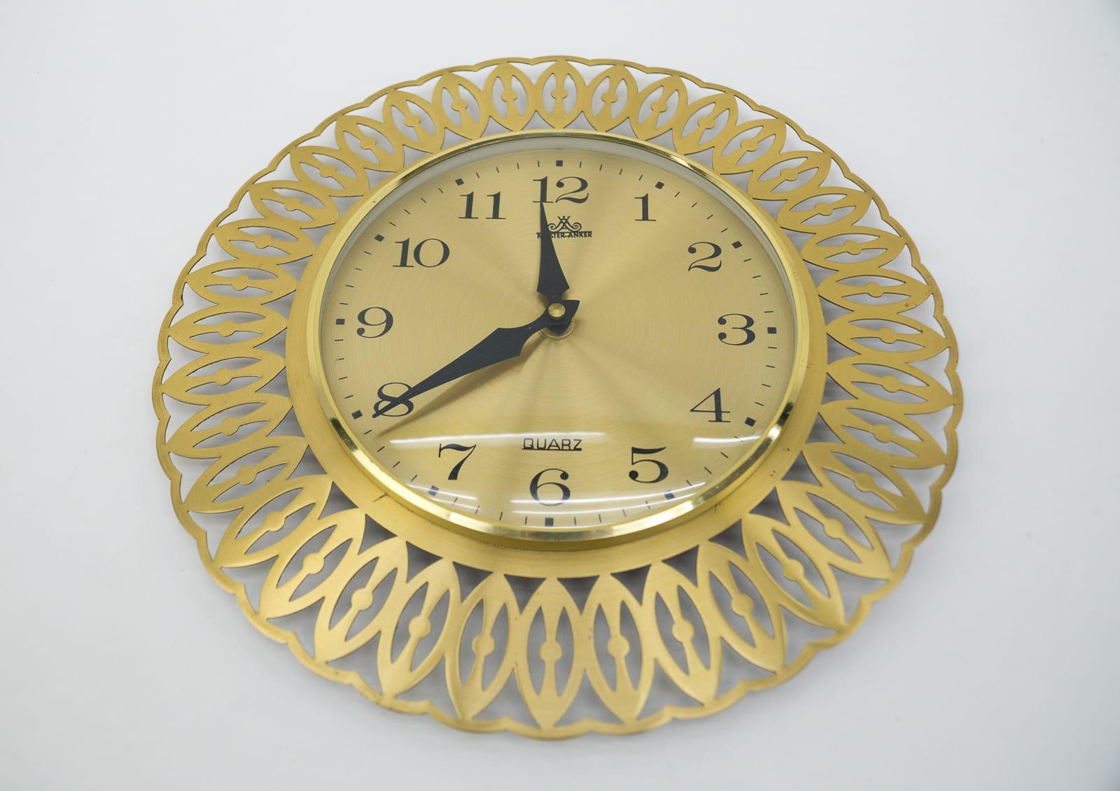 Stunning wall clock made of metal & glass. 

An eye catcher par excellence.

Made in Germany.

Electric, battery operated clock.