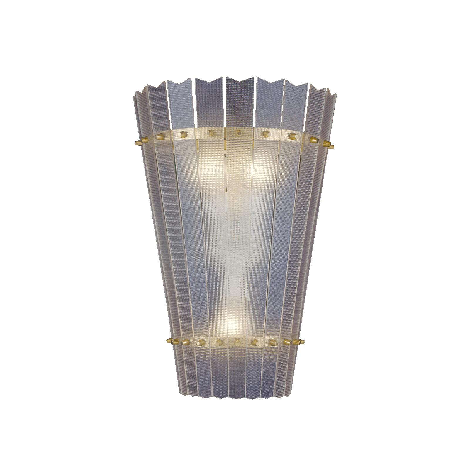A very extravagant wall-lamp with textured acrylic shade.

Most components according to the UL regulations, with an additional charge we will UL-list and label our fixtures.