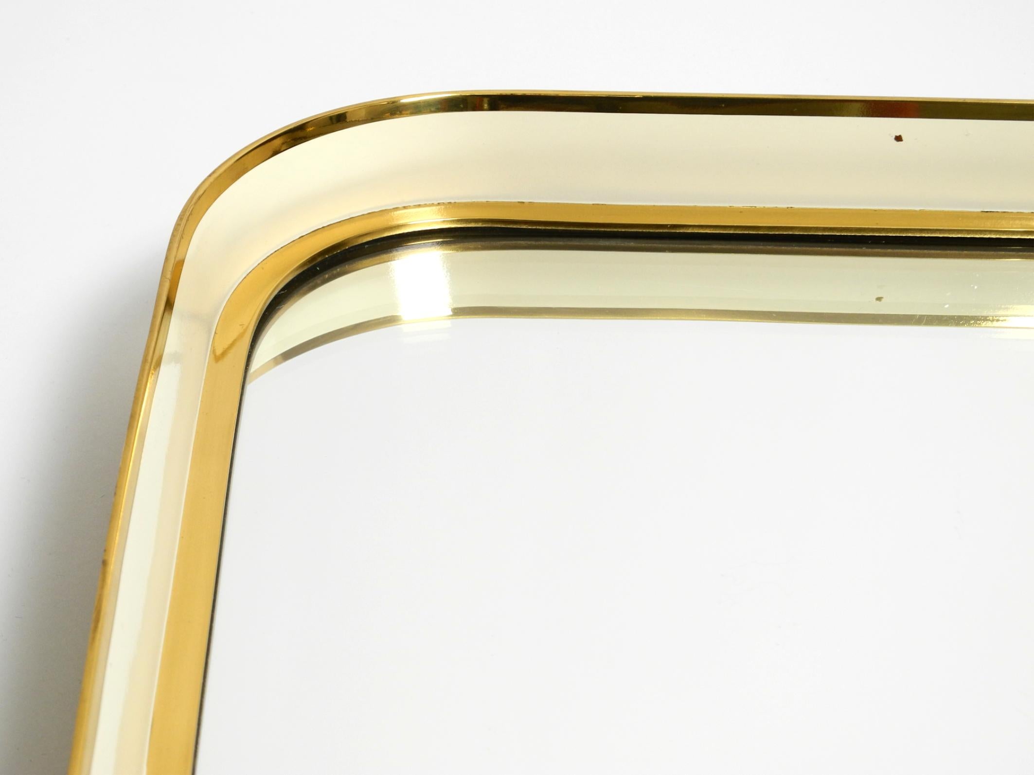 Ottone Specchio da parete del Mid Century Modern con cornice in ottone pesante di Münchener Zierspiegel in vendita