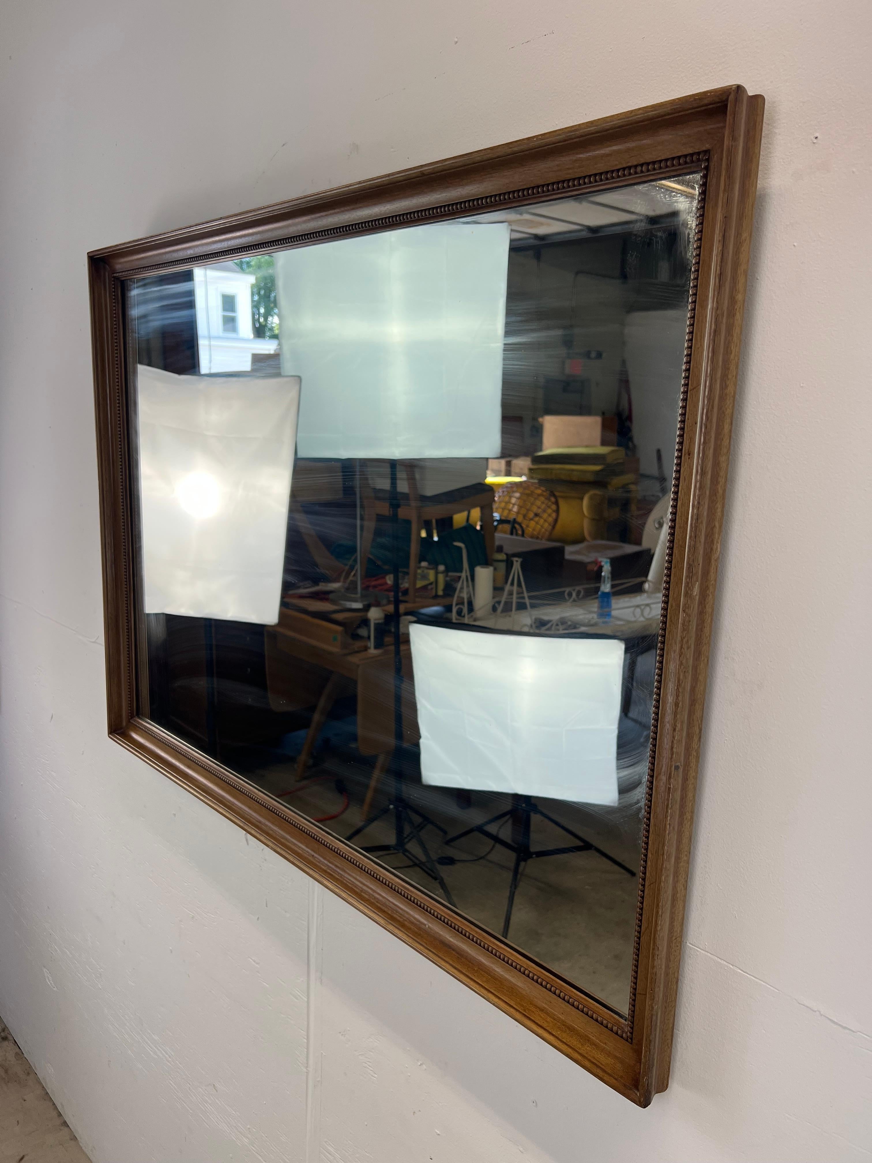 Mid Century Modern Wall Mirror with Walnut Frame by Drexel In Good Condition For Sale In Freehold, NJ
